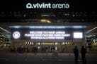 A sign advised fans to have their vaccine card ready is shown at Salt Lake City’s Vivint Arena before a Jazz game last month. It’s one of the many