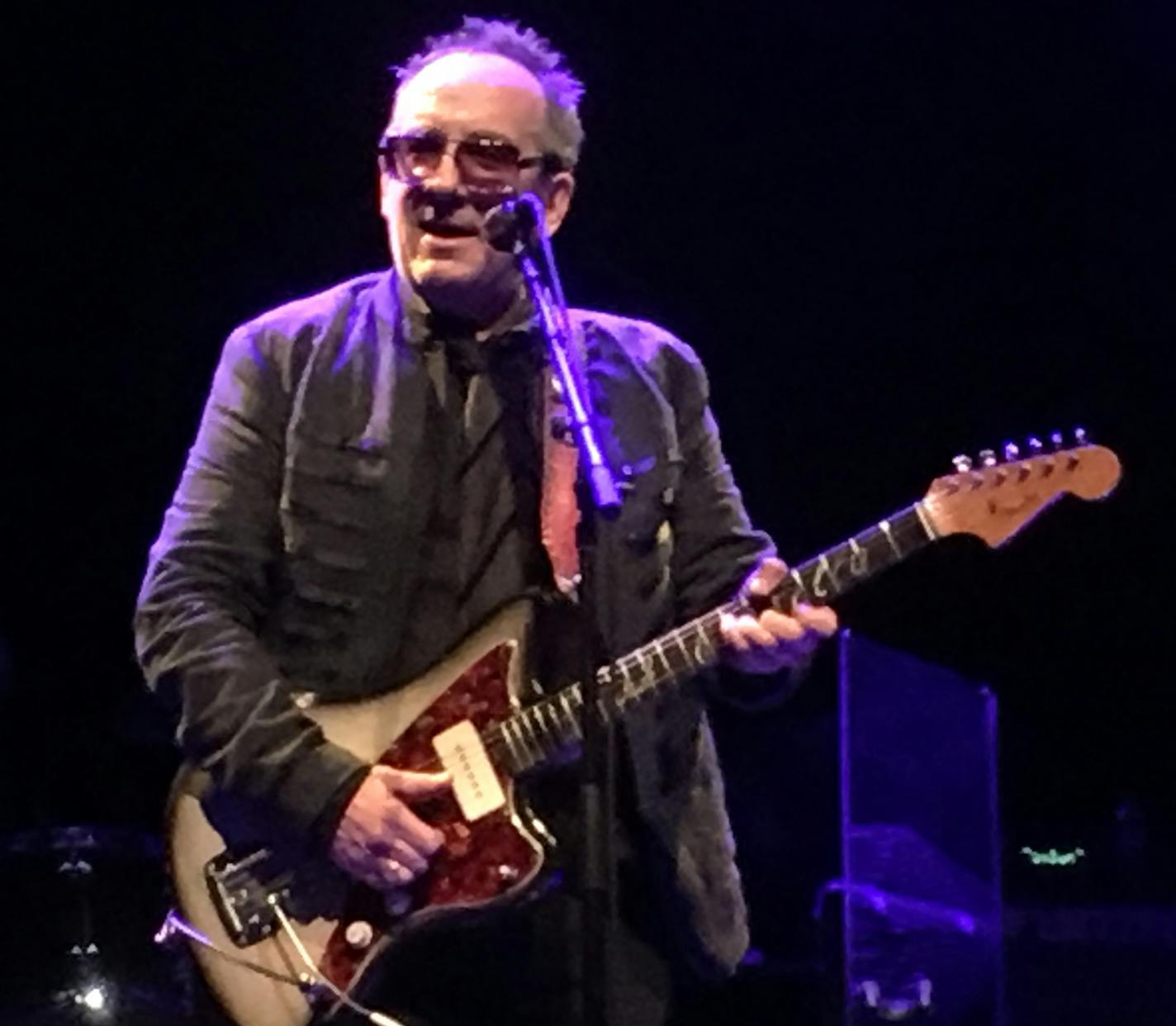 Elvis Costello arrived in town seemingly eager to reiterate he's alive and well.