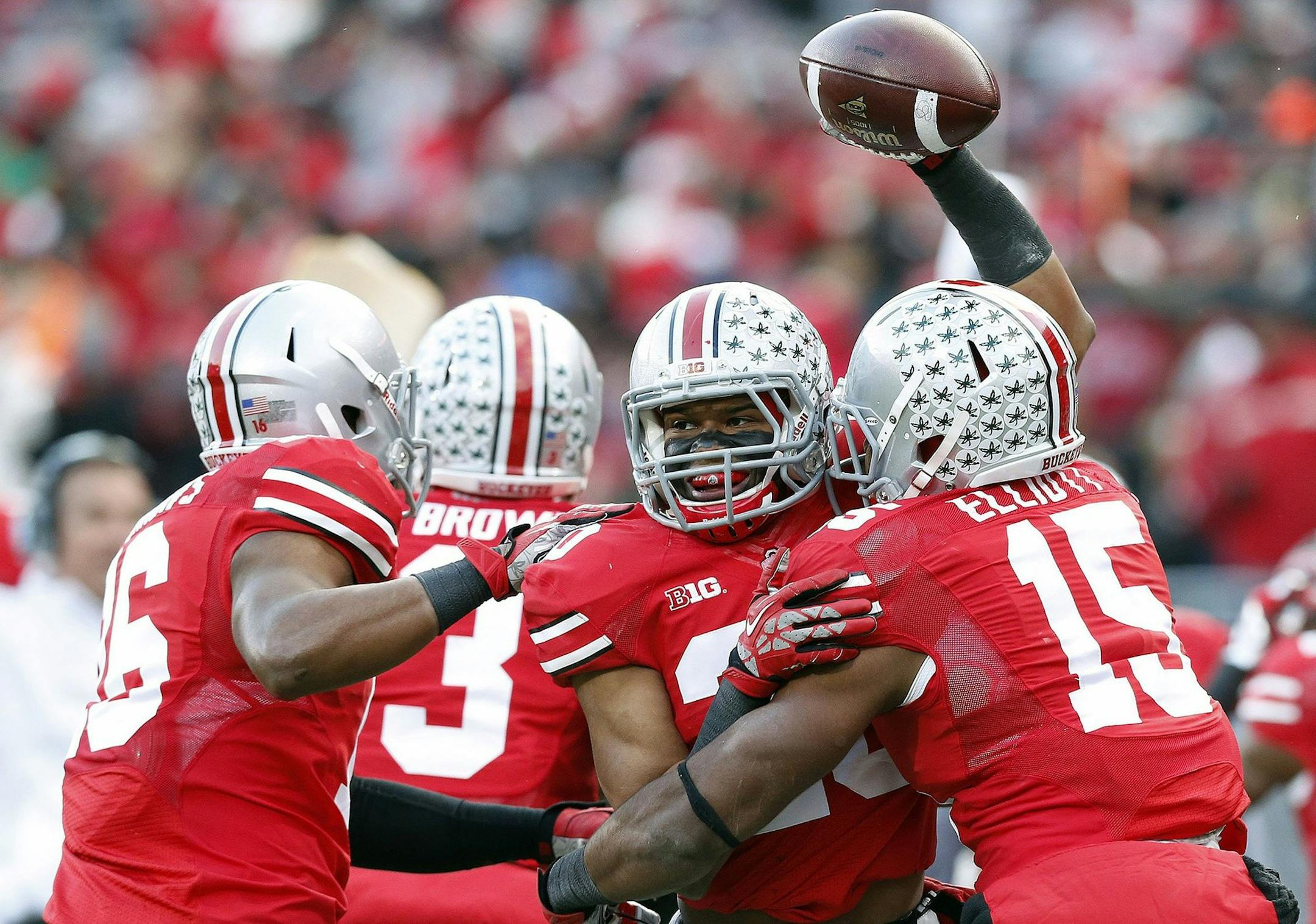 Ohio State Buckeyes defensive back Ron Tanner (20) celebrates after recovering a blocked punt against Indiana Hoosiers during the second quarter at Ohio Stadium in Columbus, Ohio, on Saturday, Nov. 23, 2013. (Kyle Robertson/Columbus Dispatch/MCT)