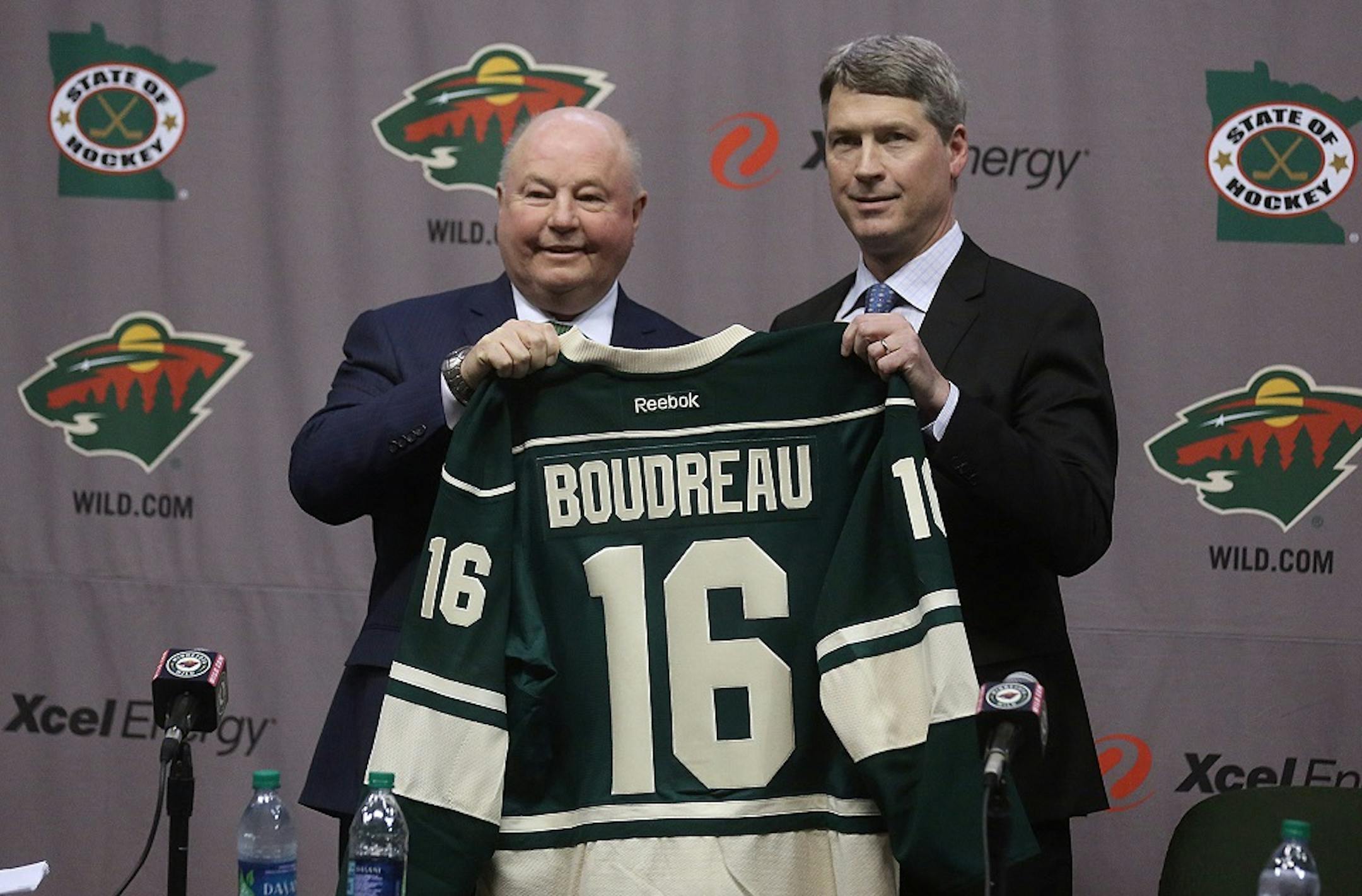 Minnesota Wild general manager Chuck Fletcher (right) introduced the team's new head coach, Bruce Boudreau, during a news conference at Xcel Energy Center. ] JIM GEHRZ • james.gehrz@startribune.com / St. Paul, MN / May 10, 2016 /12:00 PM – BACKGROUND INFORMATION:  The Minnesota Wild will introduce Head Coach Bruce Boudreau to the media at a press conference on Tuesday, May 10, at noon on the floor of the Xcel Energy Center.