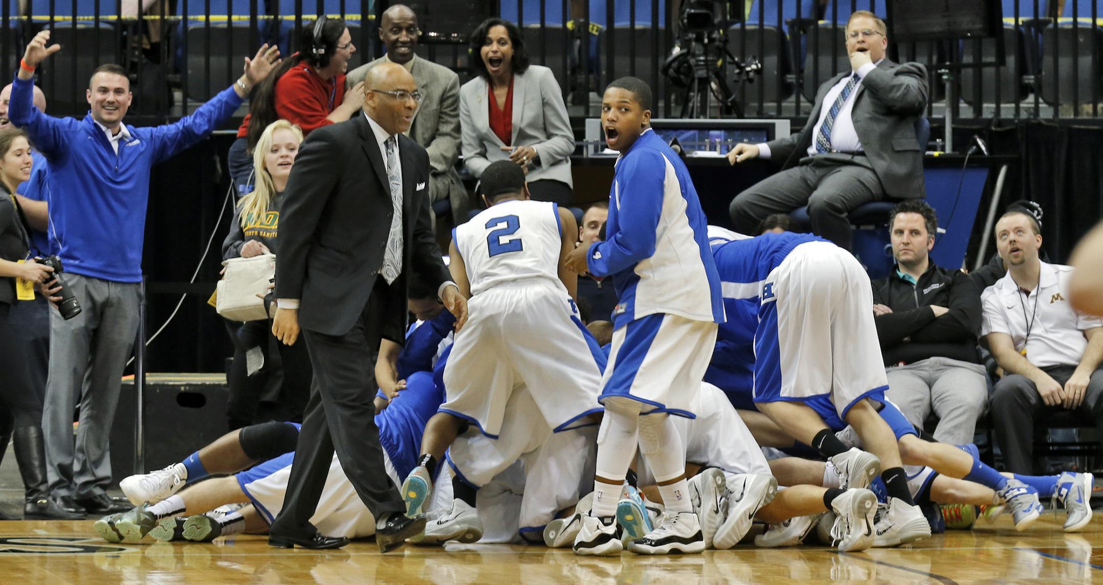 Hopkins players celebrated at the end of their victory in four overtimes. ] Class 4A Boys Basketball Tournament. Hopkins vs. Shakopee. Hopkins won in four overtimes 49-46.(MARLIN LEVISON/STARTRIBUNE(mlevison@startribune.com)