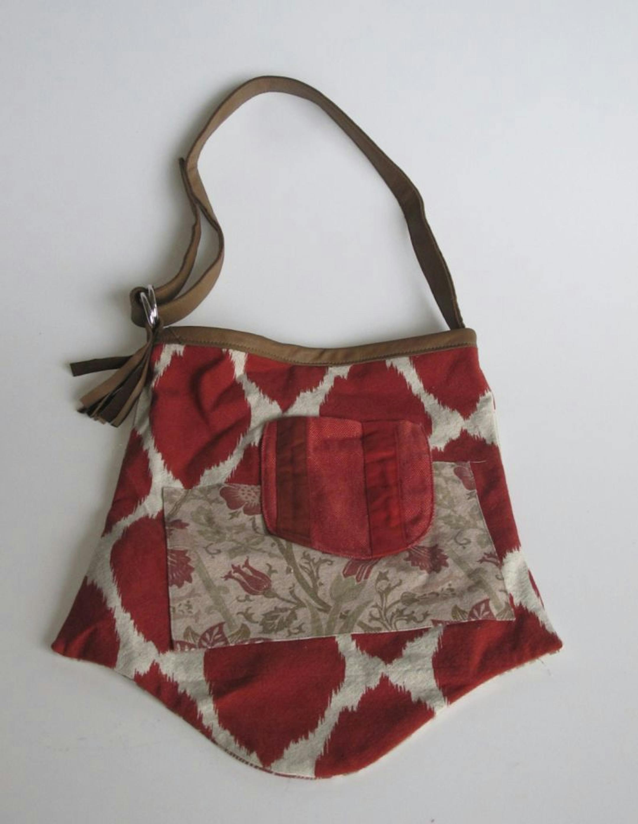 Cross-body bag by Heidi Comfort for Capsule, Ini Iyamba's new concept for limited edition local designs for under $110.