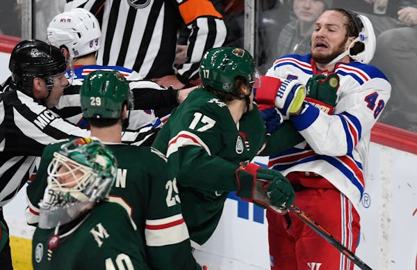 The Wild's Marcus Foligno threw a punch at New York Rangers' Brendan Lemieux during a game last March in St. Paul.