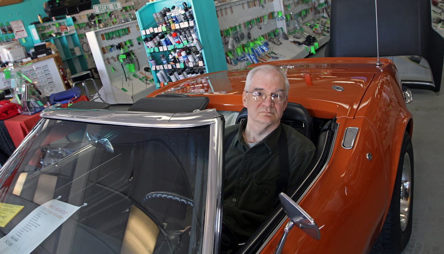 Larry Lucast, owner of Corvette Specialties of Mounds View with his 1971 Corvette Stingray. Lucast is tired of his competition not having to collect sales tax. Customers who buy Corvette parts are suppose to submit a "use tax," but they rarely do, and he's going out of business because his brick-and-mortar operation can't compete. Photographed on 2/19/13.] Bruce Bisping/Star Tribune bbisping@startribune.com Larry Lucast/source.