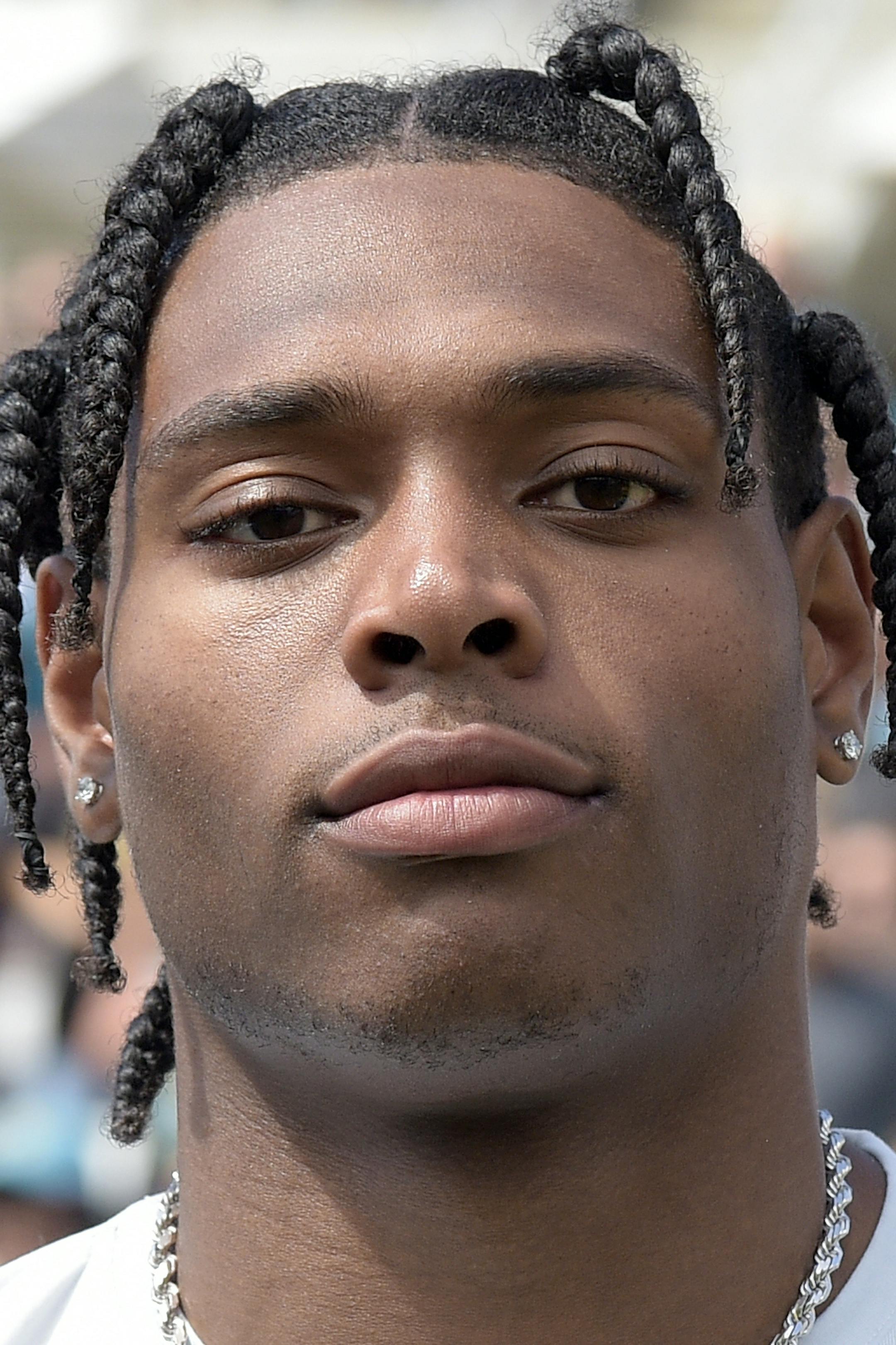Jacksonville Jaguars cornerback Jalen Ramsey stands on the sideline for the playing of the national anthem before an NFL football game against the New Orleans Saints Sunday, Oct. 13, 2019, in Jacksonville, Fla. (AP Photo/Phelan M. Ebenhack)