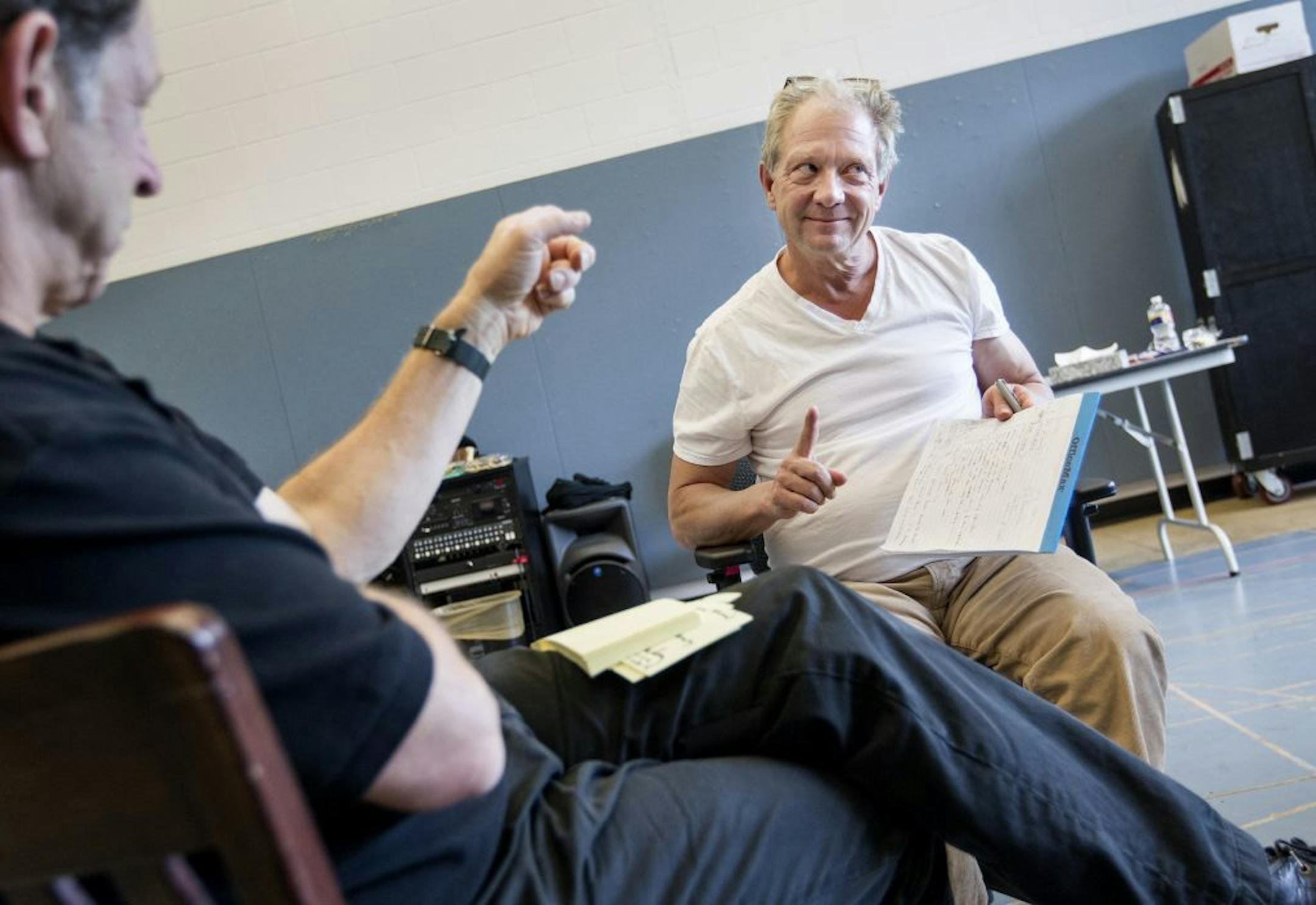 Actor Sal Viscuso, left, agrees with director Jeff Perry as Perry gives notes during a rehearsal for "A Steady Rain" at the Guthrie Theater in Minneapolis October 6, 2014.