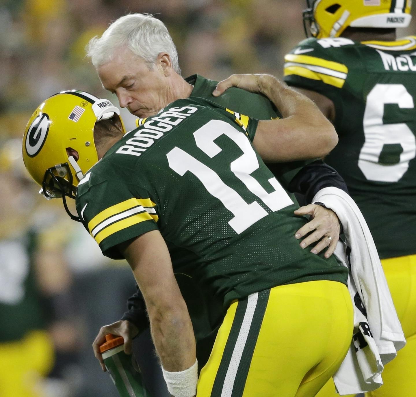 Green Bay Packers quarterback Aaron Rodgers is hurt after being sacked during the first half of an NFL football game against the Chicago Bears Sunday, Sept. 9, 2018, in Green Bay, Wis. (AP Photo/Jeffrey Phelps) ORG XMIT: WIMG115