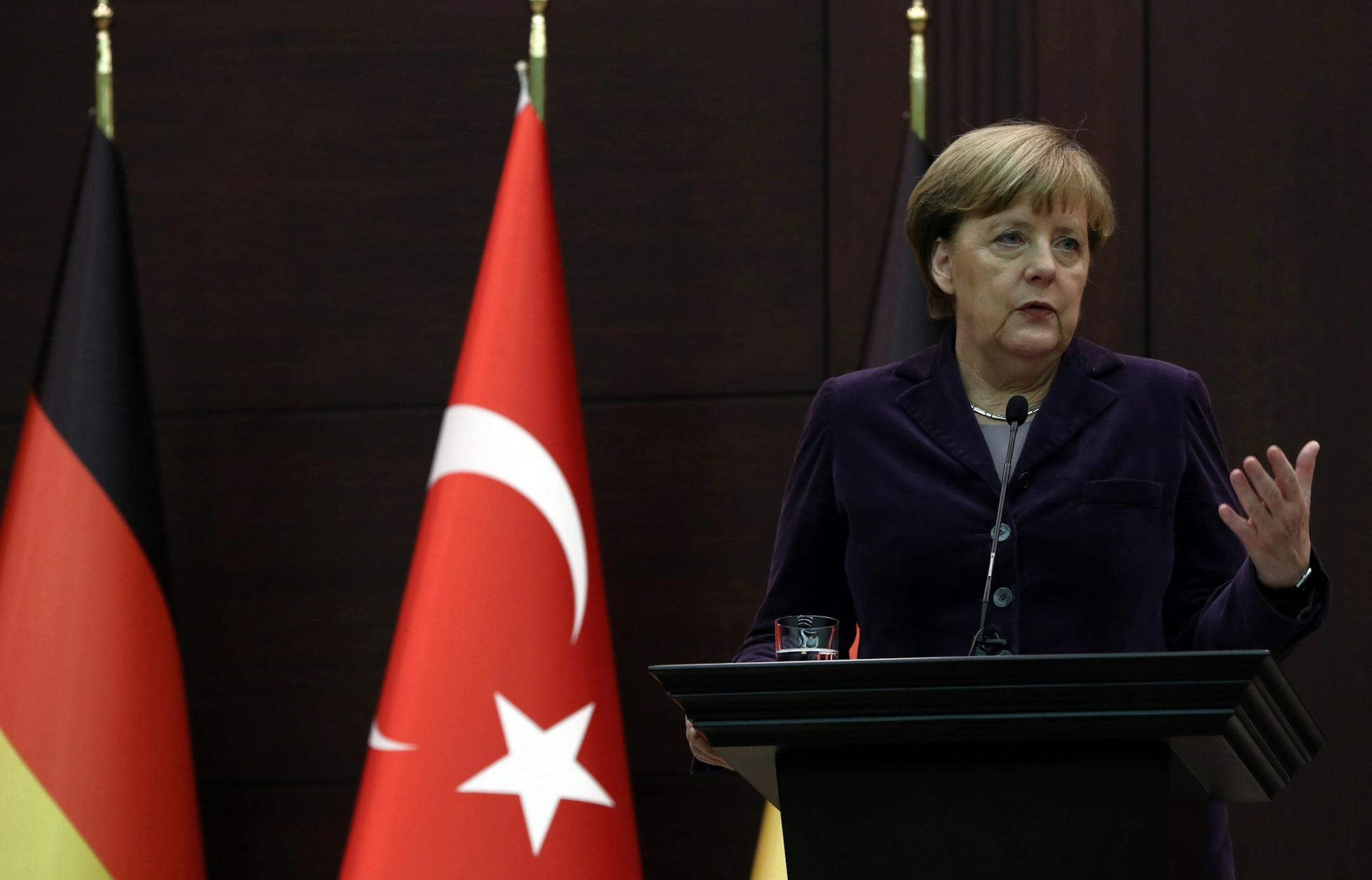 German Chancellor Angela Merkel speaks to the media during a joint news conference with Turkish Prime Minister Ahmet Davutoglu in Ankara, Turkey, Monday, Feb. 8, 2016. Turkey and Germany agreed on Monday on a set of measures to deal with the Syrian refugee crisis, including a joint diplomatic initiative aiming to halt attacks against Syria’s largest city. Merkel said after talks with Davutoglu that she is “not just appalled but horrified” by the suffering caused by Russian b