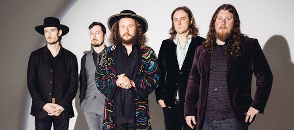 In this May 7, 2015 photo, members of My Morning Jacket, from left, Bo Koster, Tom Blankenship, Jim James, Carl Broemel, Patrick Hallahan pose for a p