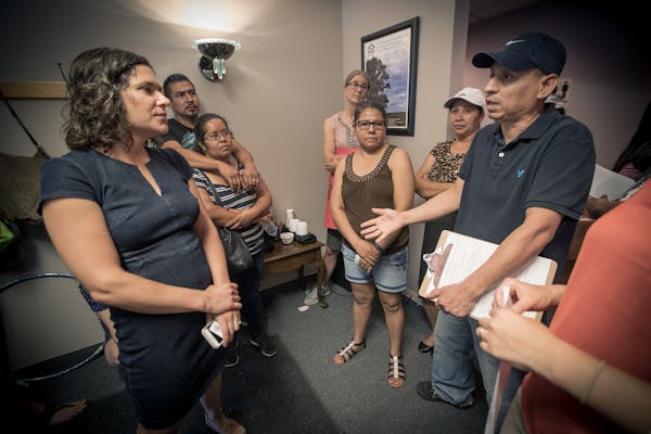 Jose Lopez, who has lived in a south Minneapolis apartment building for 25 years, pleaded for help from Council Member Lisa Bender at Nexus Real Estat