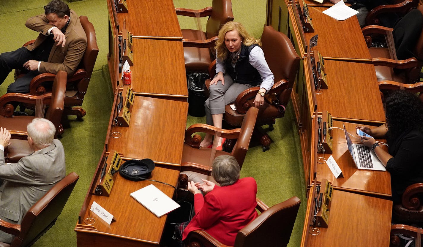 State Representatives including Rep. Heather Edelson, DFL-Edina, and Rep. Sandra Masin, DFL-Eagan, worked to keep the recommended distancing as the Minnesota House convened to pass COVID relief legislation amid the Coronavirus pandemic Thursday. ] ANTHONY SOUFFLE &#x2022; anthony.souffle@startribune.com The Minnesota House convened to pass COVID relief legislation amid the Coronavirus pandemic Thursday, March 26, 2020 at the Minnesota State Capitol Building in St. Paul, Minn.