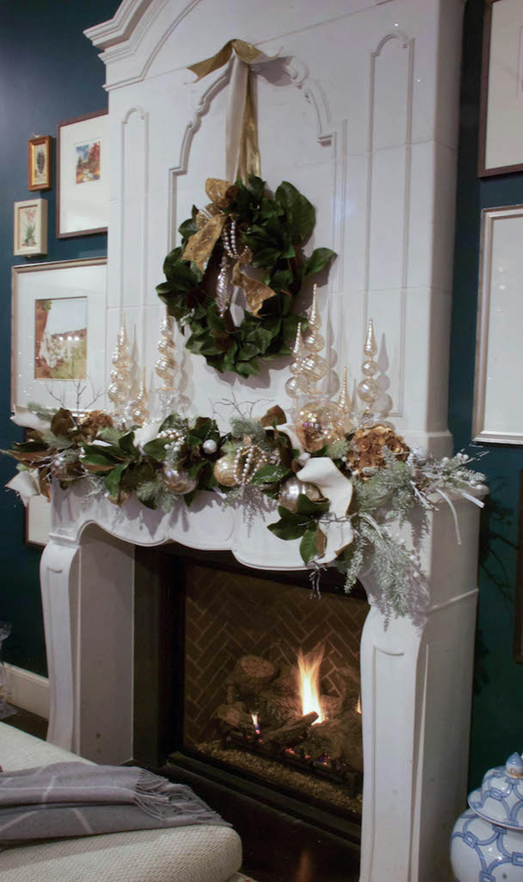 A garland of holiday greens is the base layer of every mantel display we create. (Mary Carol Garrity/TNS) ORG XMIT: 1216342