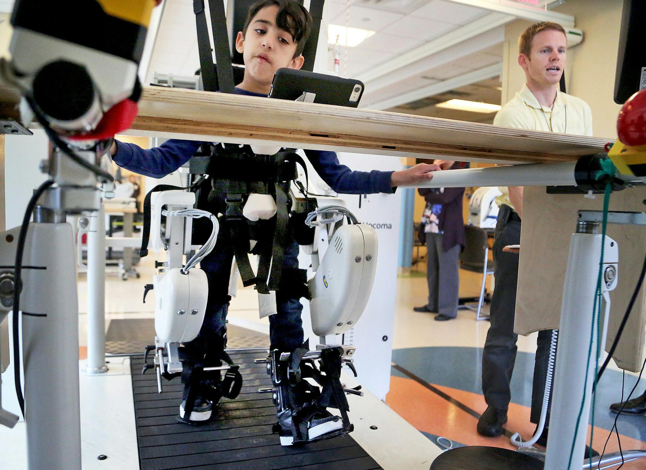 Gillette Children's Hospital physical therapist Kellen Feeney utilizes a robalt, which means robotic assisted locomotor training, to aid a young patient in movement at Gillette Children's Hospital Wednesday, Oct. 11, 2017, in St. Paul, MN.] DAVID JOLES ï david.joles@startribune.com (EDITOR'S NOTE: FAMILY DOESN'T WANT CHILD IDENTIFIED) Gillette Children's Hospital celebrates its 120th year. In 1897, South St. Paul native Dr. Arthur Gillette presented a paper to the Minnesota Board of Correct