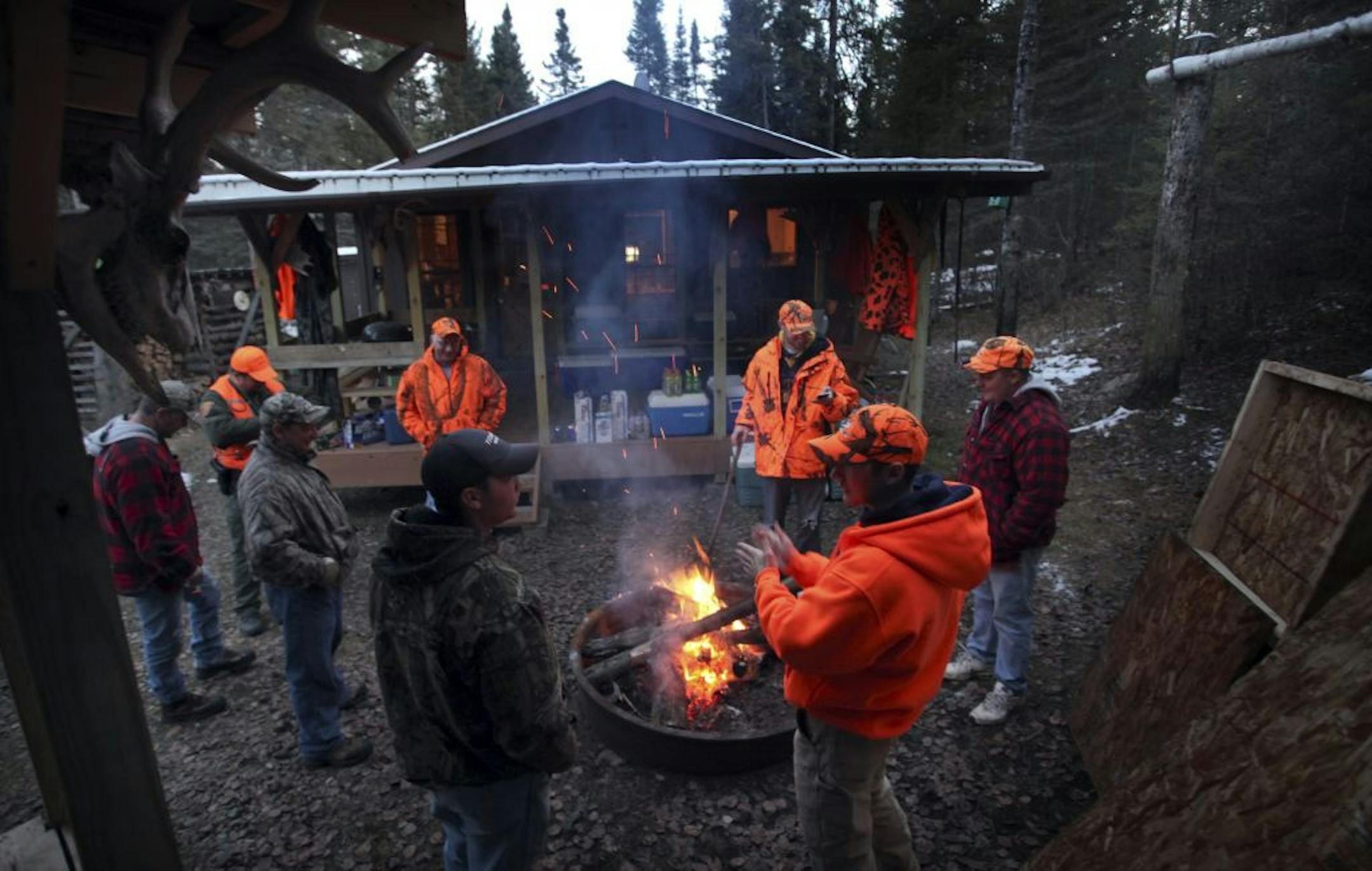 Thirteen deer hunters gathered at this camp Friday, Nov., 2012, near Tower, Minn., where two of the hunters had drawn permits to shoot a wolf in addition to having a license to shoot a deer.