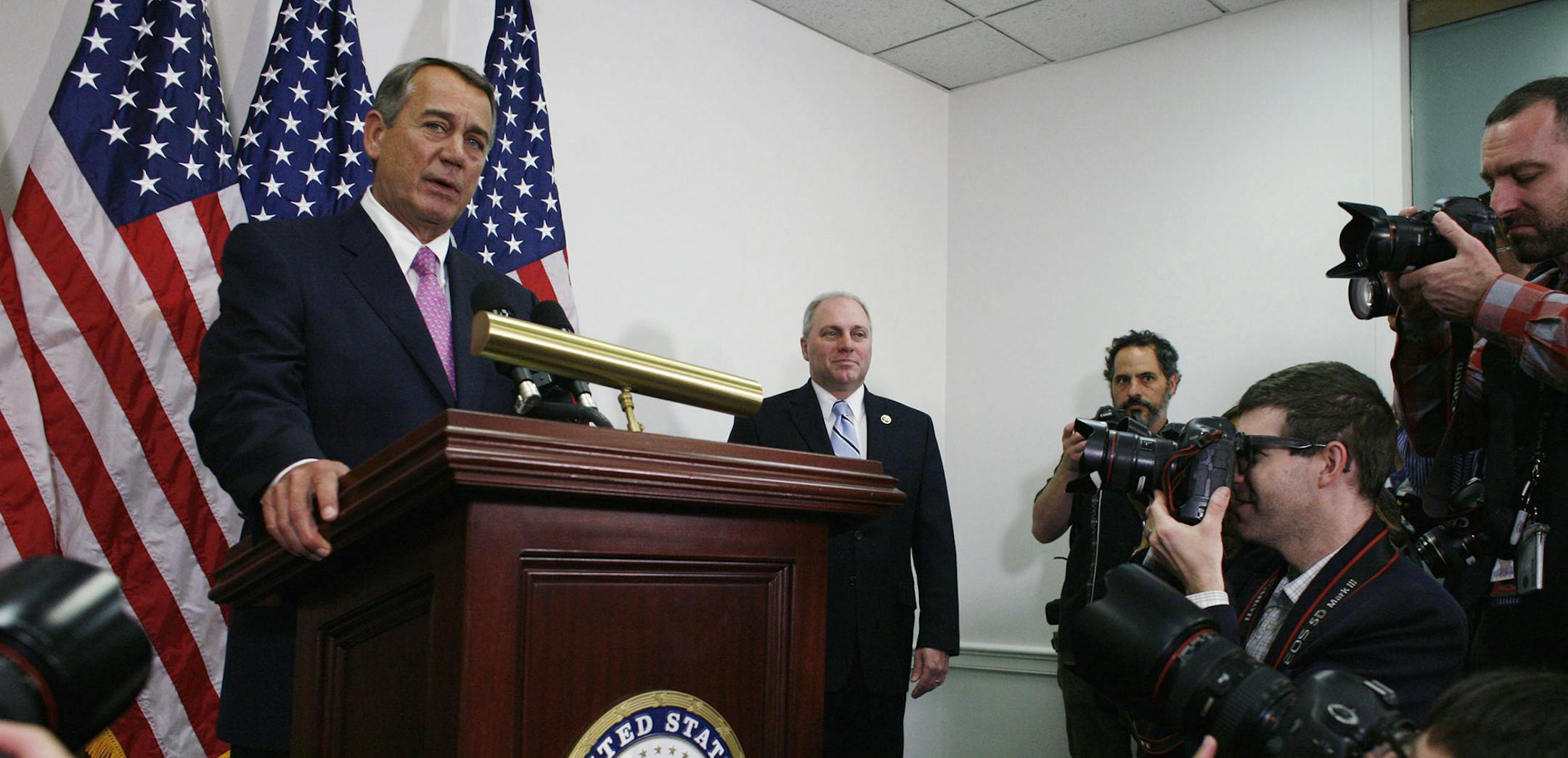 Outgoing House Speaker John Boehner of Ohio, accompanied by House Majority Whip Steve Scalise of La., right, talks with reporters on Capitol Hill in Washington, Tuesday, Oct. 27, 2015. House Republican leaders on Tuesday pushed toward a vote on a two-year budget deal despite conservative opposition, relying on the backing of Democrats for the far-reaching pact struck with President Barack Obama. In his last days as speaker, John Boehner was intent on getting the measure through Congress and head