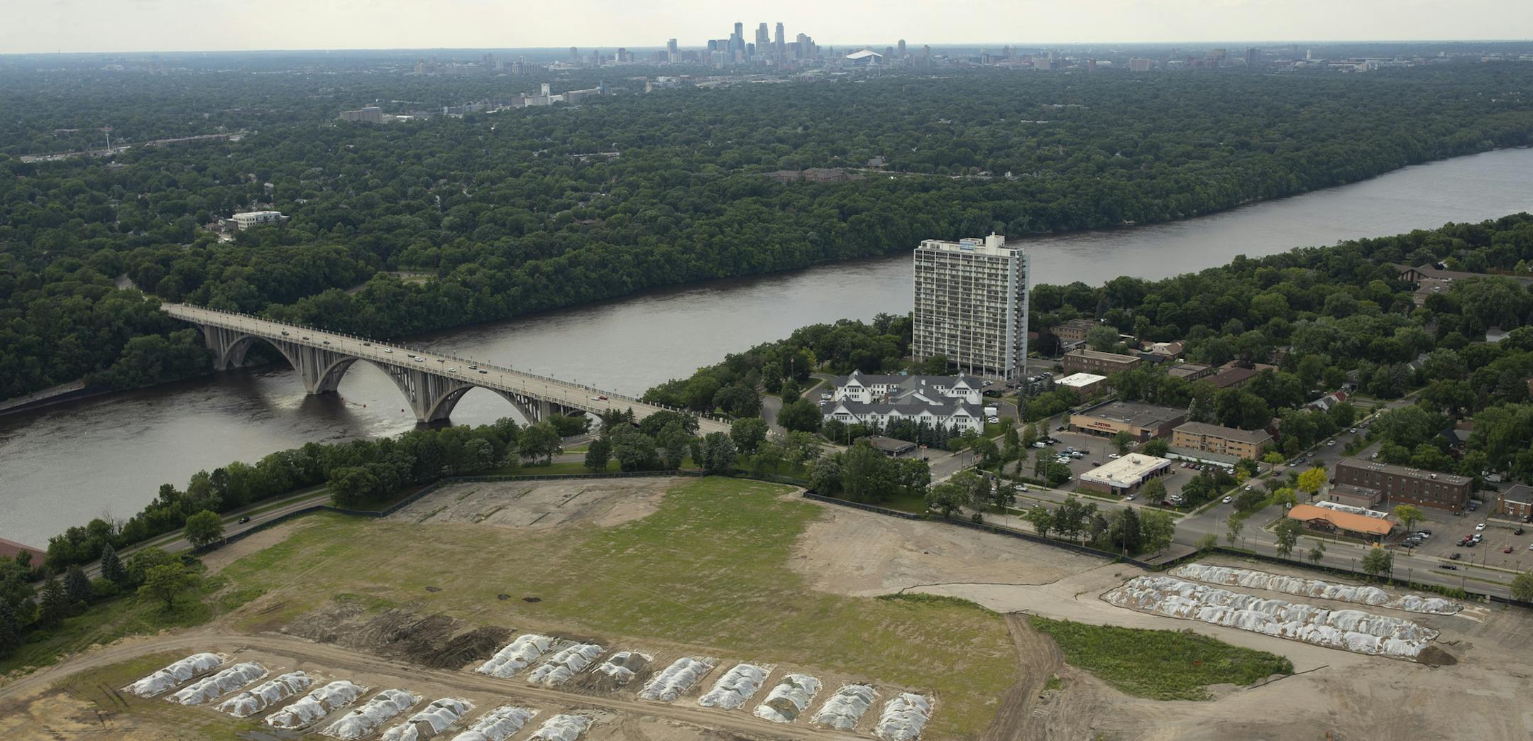 The former Ford assembly plant site, looking northwest, with the downtown Minneapolis in the background. ] JEFF WHEELER ï jeff.wheeler@startribune.com Minneapolis based Ryan Cos. US Inc. announced Monday that it will buy the site of the former Ford assembly plant, transforming the 122-acre parcel in the Highland Park neighborhood into a high-density urban village.The site near the Mississippi River was photographed from the air Monday evening, June 25, 2018.