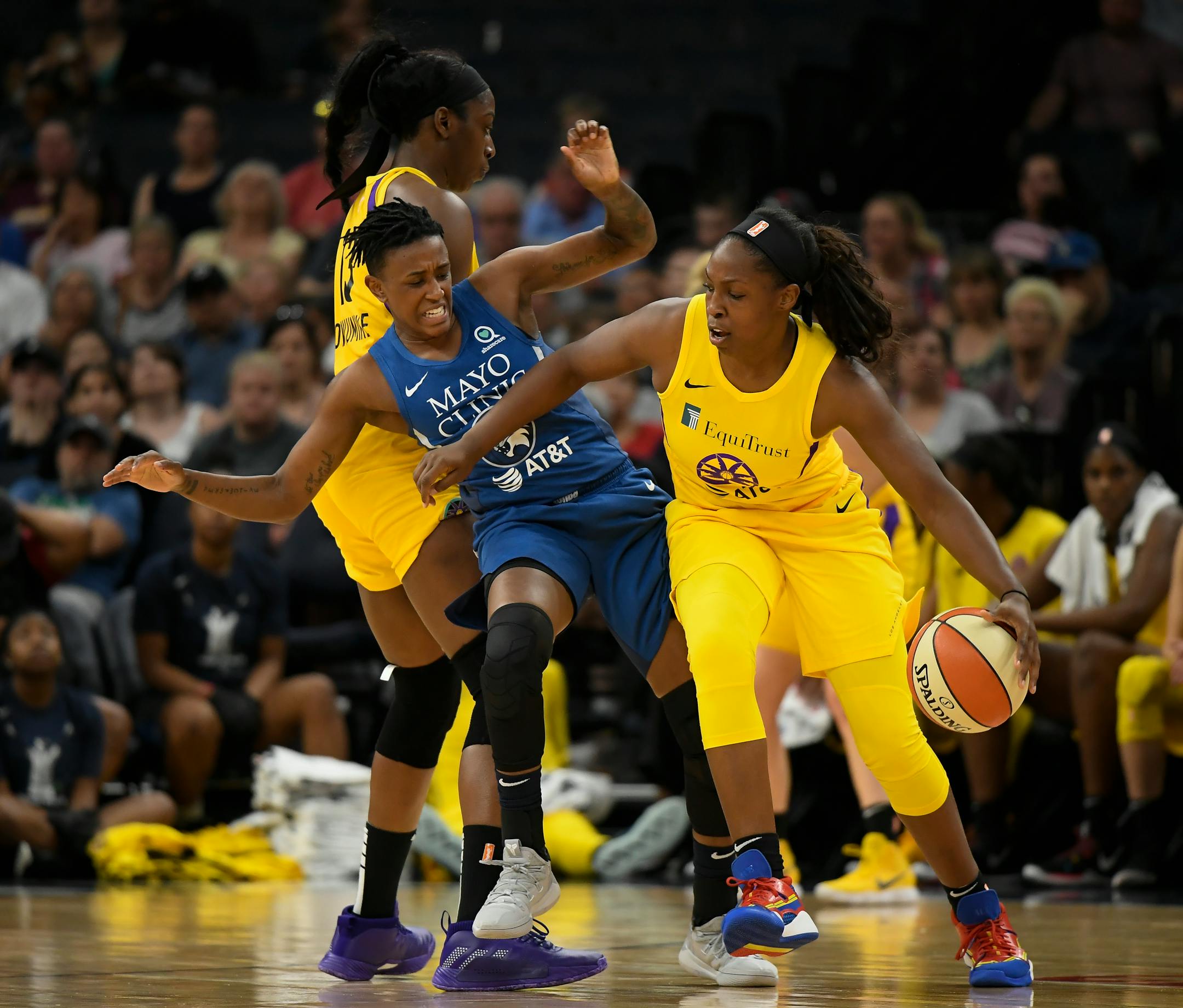 Los Angeles guard Chelsea Gray knocked Lynx guard Danielle Robinson into Chiney Ogwumike in the first half.