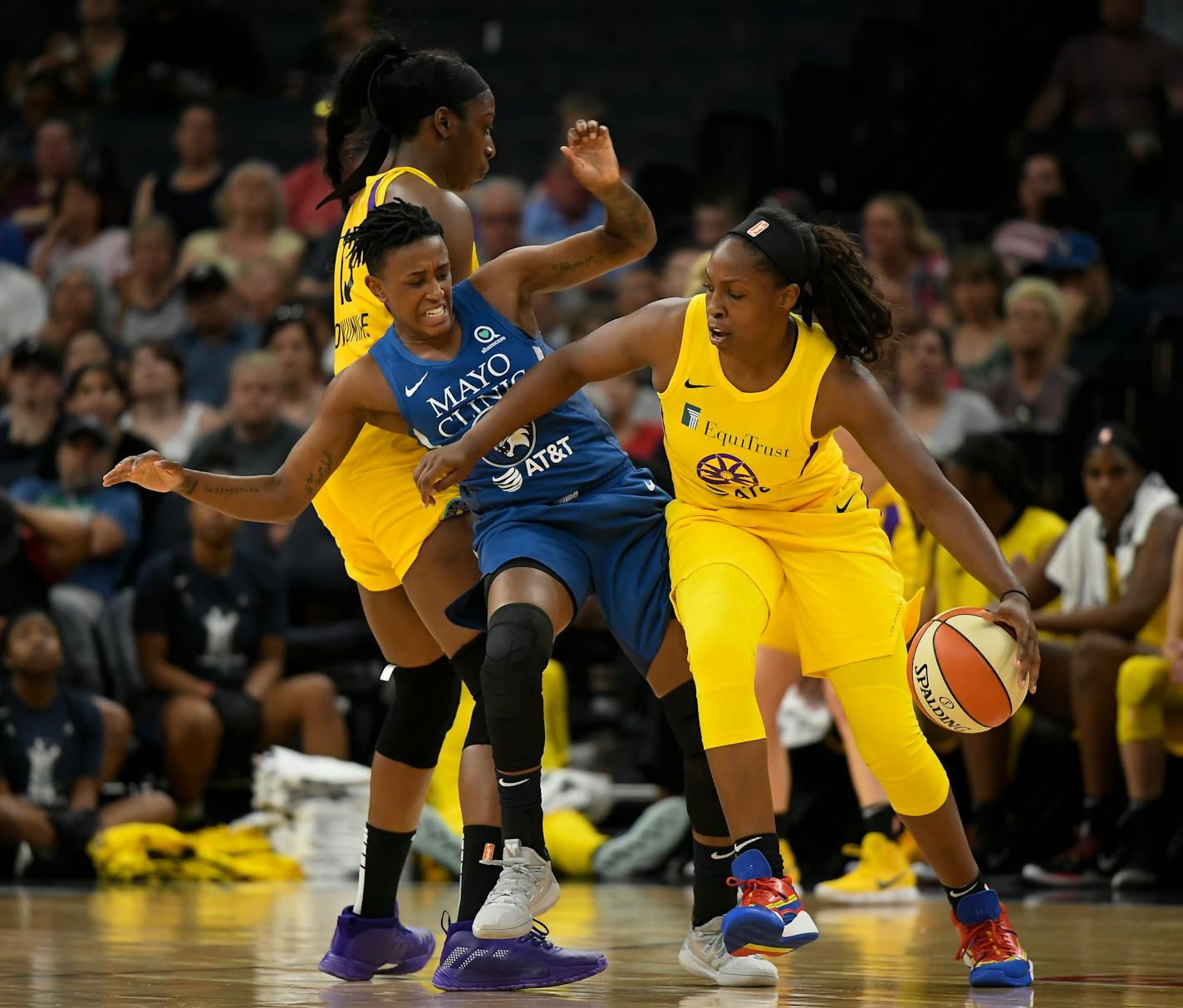 Los Angeles guard Chelsea Gray knocked Lynx guard Danielle Robinson into Chiney Ogwumike in the first half.