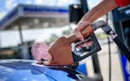 Under the proposal from Minnesota Gov. Tim Walz and House Democrats, the state gas tax would increase from its current 28.5-cents-per-gallon to 48.5 c