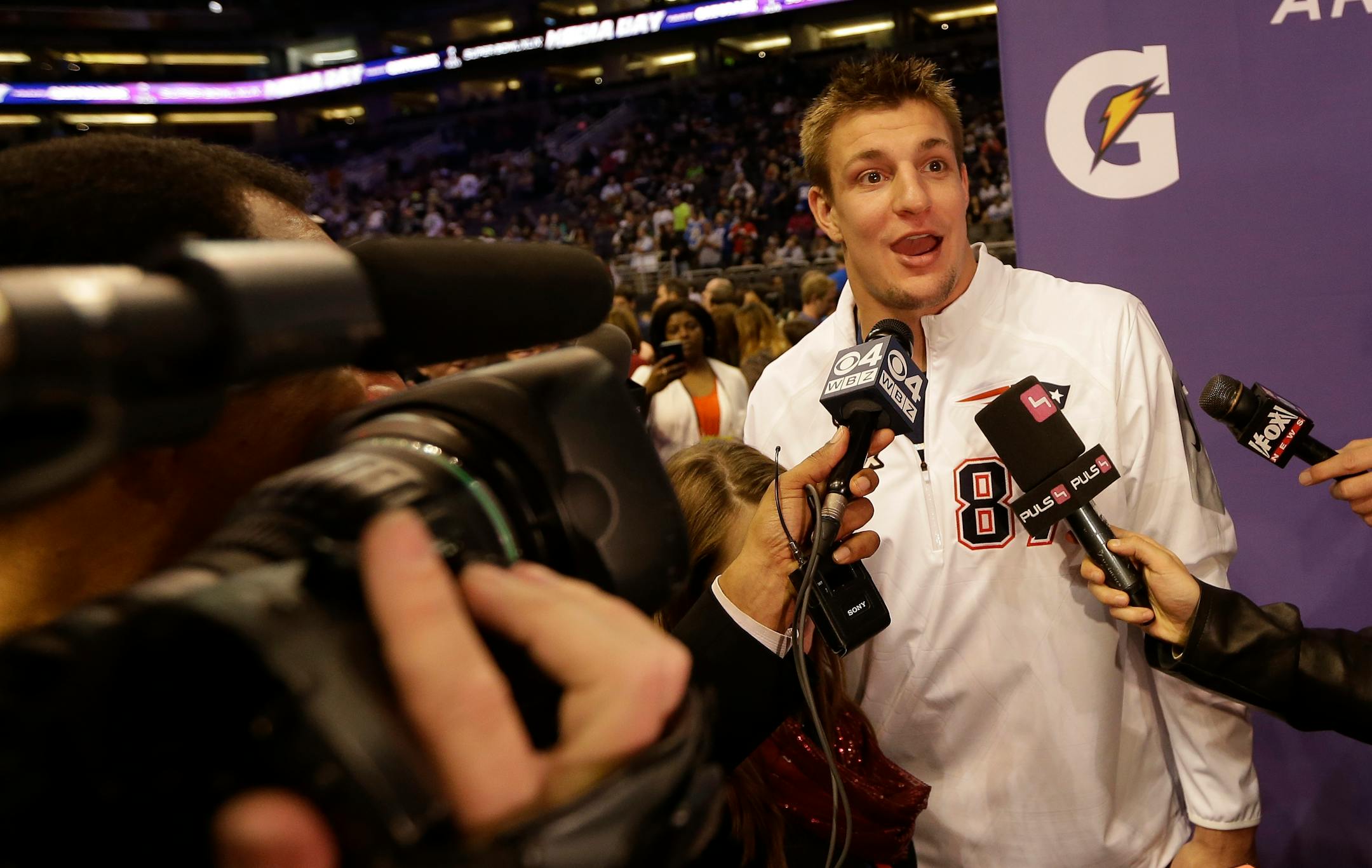 New England Patriots' Rob Gronkowski answers questions during media day for NFL Super Bowl XLIX football game Tuesday, Jan. 27, 2015, in Phoenix. (AP Photo/David J. Phillip)