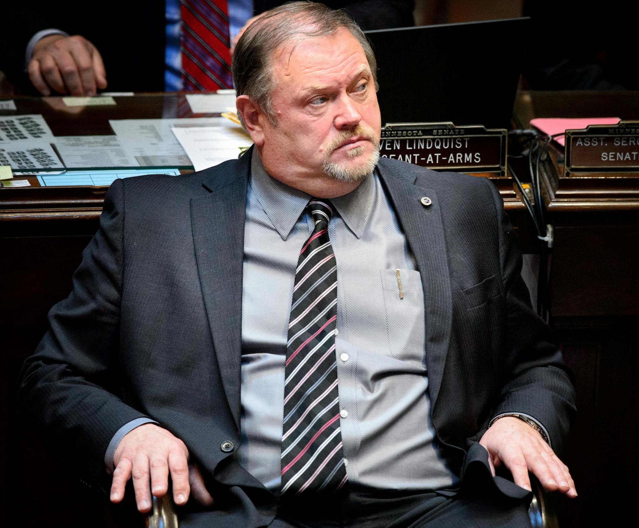 Majority Leader Tom Bakk tapped his fingers on his chair as the Senated voted on the bill with Bakk's amendment that would delay raises for Governor Dayton's commissioners. ] GLEN STUBBE * gstubbe@startribune.com Thursday, February 12, 2015