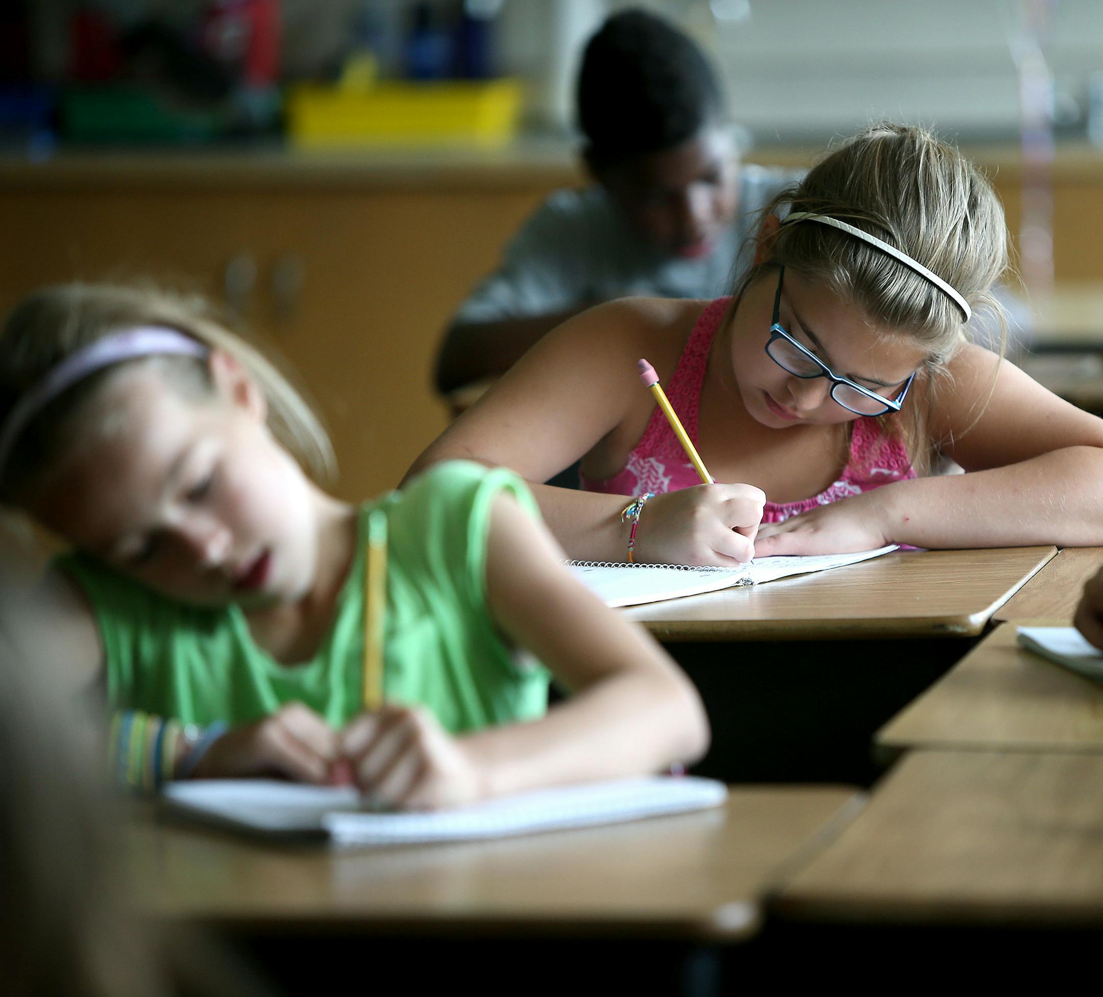 Cara Croonquist's class sat and wrote about their thoughts on a book at Hale Elementary School, Thursday, June 5, 2014 in Minneapolis, MN. ] (ELIZABETH FLORES/STAR TRIBUNE) ELIZABETH FLORES • eflores@startribune.com