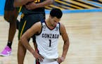 Gonzaga guard Jalen Suggs (1) walks on the court at the end of the championship game against Baylor.