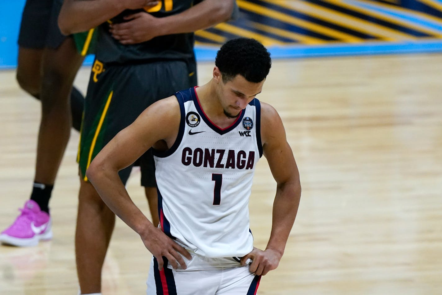 Gonzaga guard Jalen Suggs (1) walks on the court at the end of the championship game against Baylor.