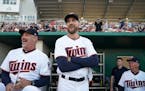 Minnesota Twins manager Rocco Baldelli (5) and Minnesota Twins bench coach Derek Shelton (9) joked with coaches from the Tampa Bay Rays before Saturda