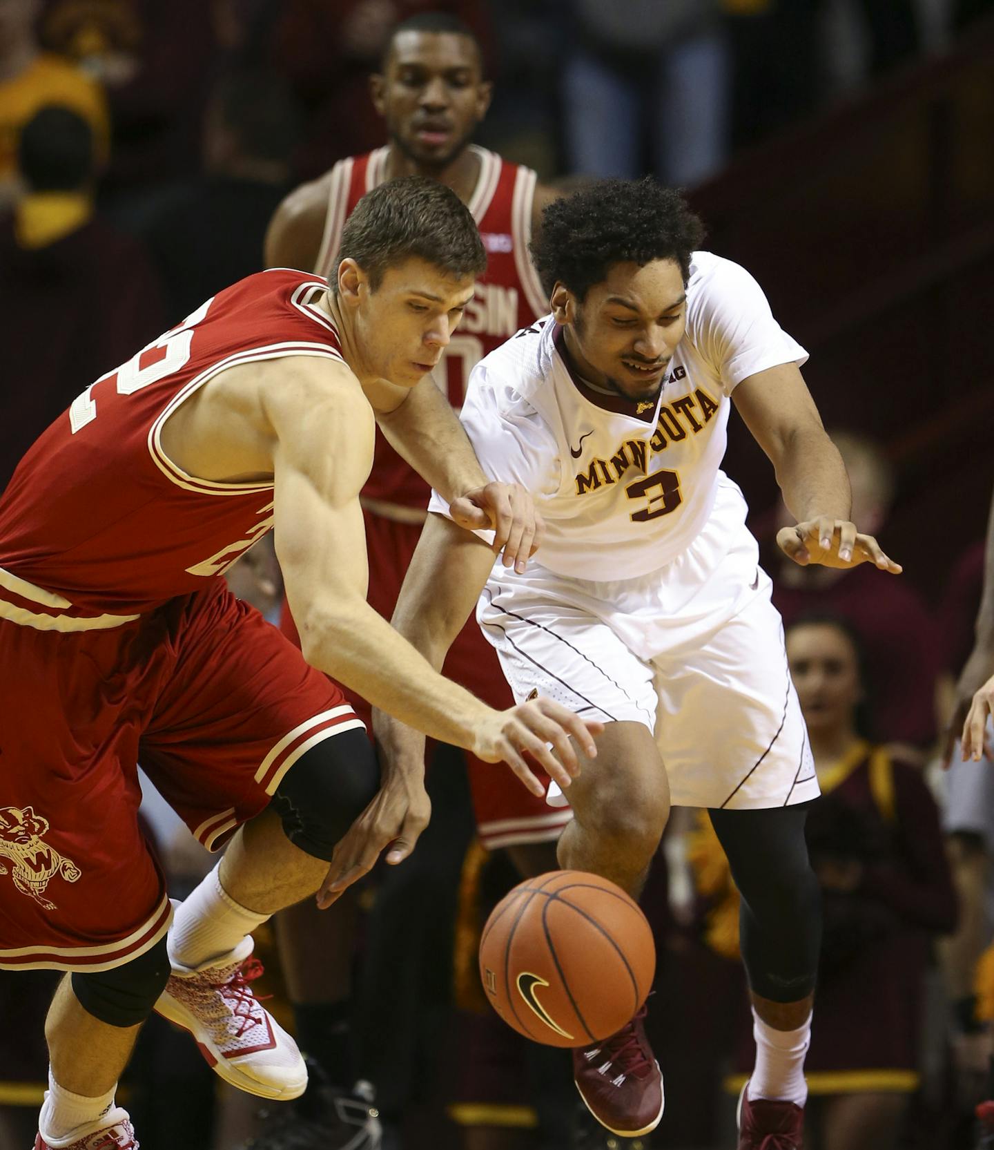 Badgers forward Ethan Happ (22) stole the ball from Gophers forward Jordan Murphy (3) in the first half Wednesday night. ] JEFF WHEELER &#xef; jeff.wheeler@startribune.com The University of Minnesota men's basketball team faced Wisconsin Wednesday night, March 2, 2016 at Williams Arena in Minneapolis.