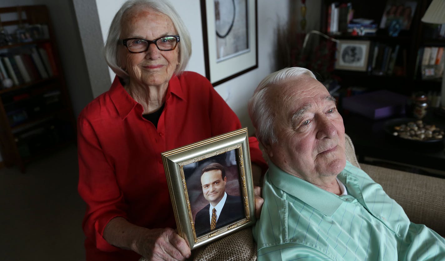 Tom and Bev Burnett. Bev held her favorite picture of her son Tom Burnett Jr. The family is giving historical societies some of Tom jr., memorabilia. Jurgen's said she hoped that can inspire other people. ] (KYNDELL HARKNESS/STAR TRIBUNE) kyndell.harkness@startribune.com Tom and Bev Burnett talked about donating memorabilia from their son to historical societies from their home in Bloomington Min., Tuesday September 8, 2015. parents of 9/11 hero Tom Burnett, who helped tackle the hijackers who e