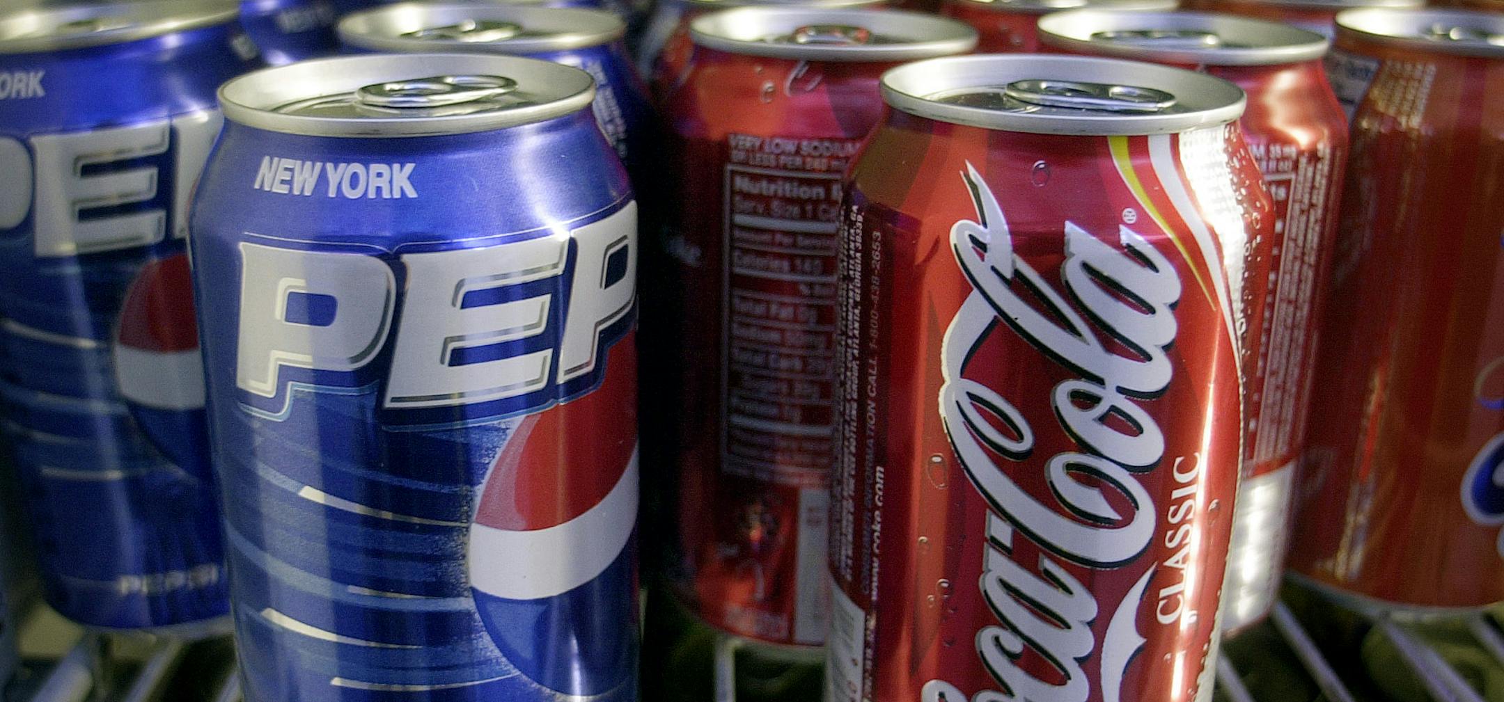 Cans of Pepsi and Coke