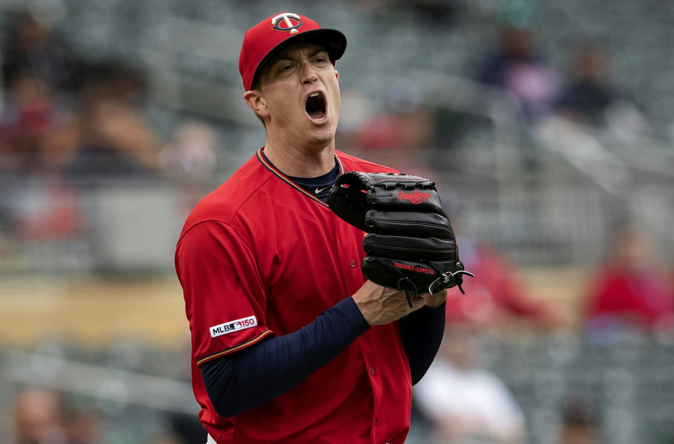 Minnesota Twins starting pitcher Kyle Gibson reacted after a throwing error to first base in the sixth inning.