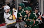 Minnesota Wild left wing Marcus Foligno (17) connected with a right to the jaw of Vegas Golden Knights defenseman Nick Holden (22) in the third period