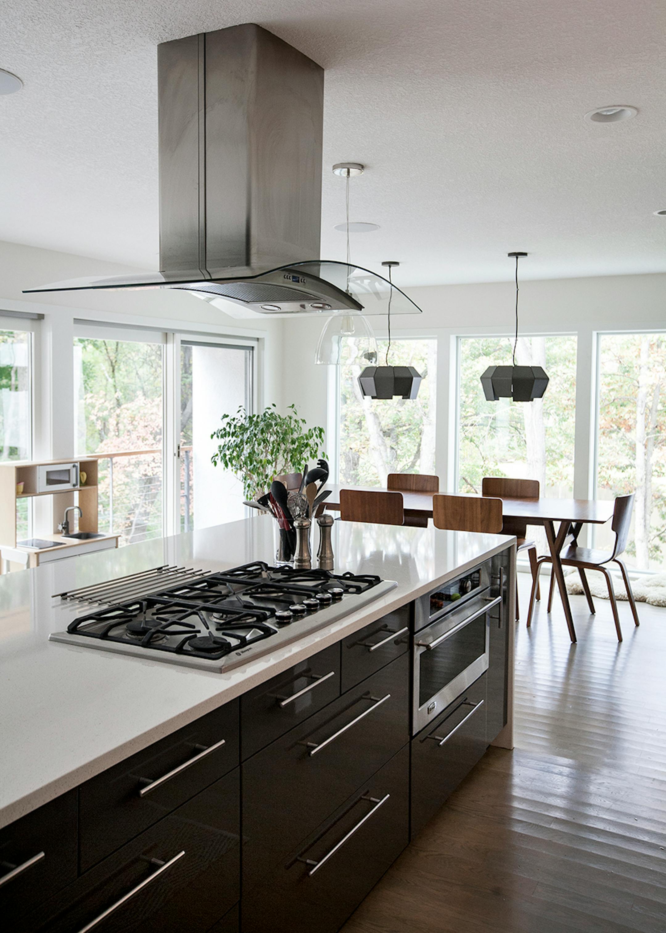 The quartz-topped kitchen island and cooktop.