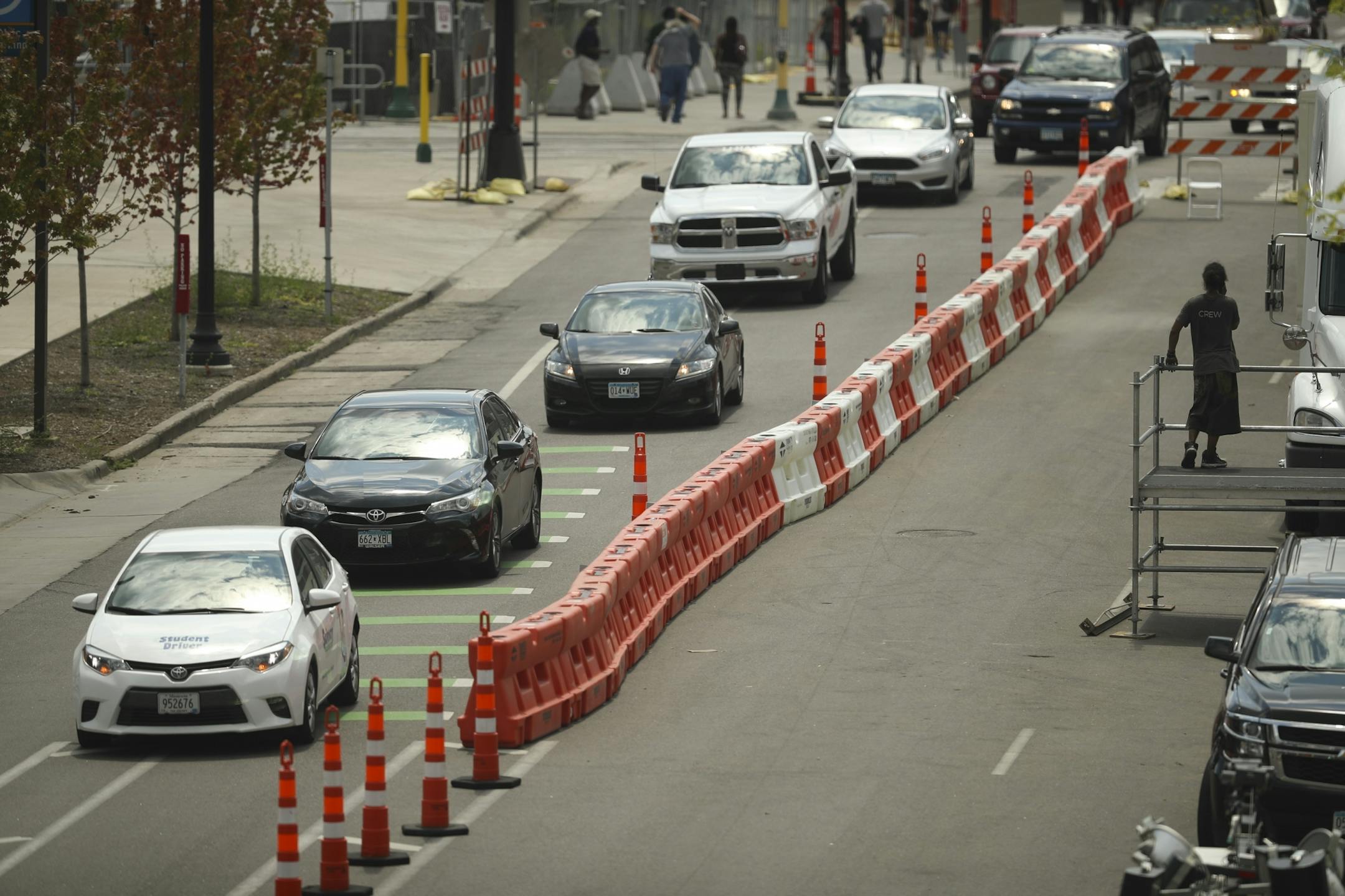 Park Ave. S. is closed down to one lane as workers set up a stage in The Commons Park in advance of the X Games this weekend.