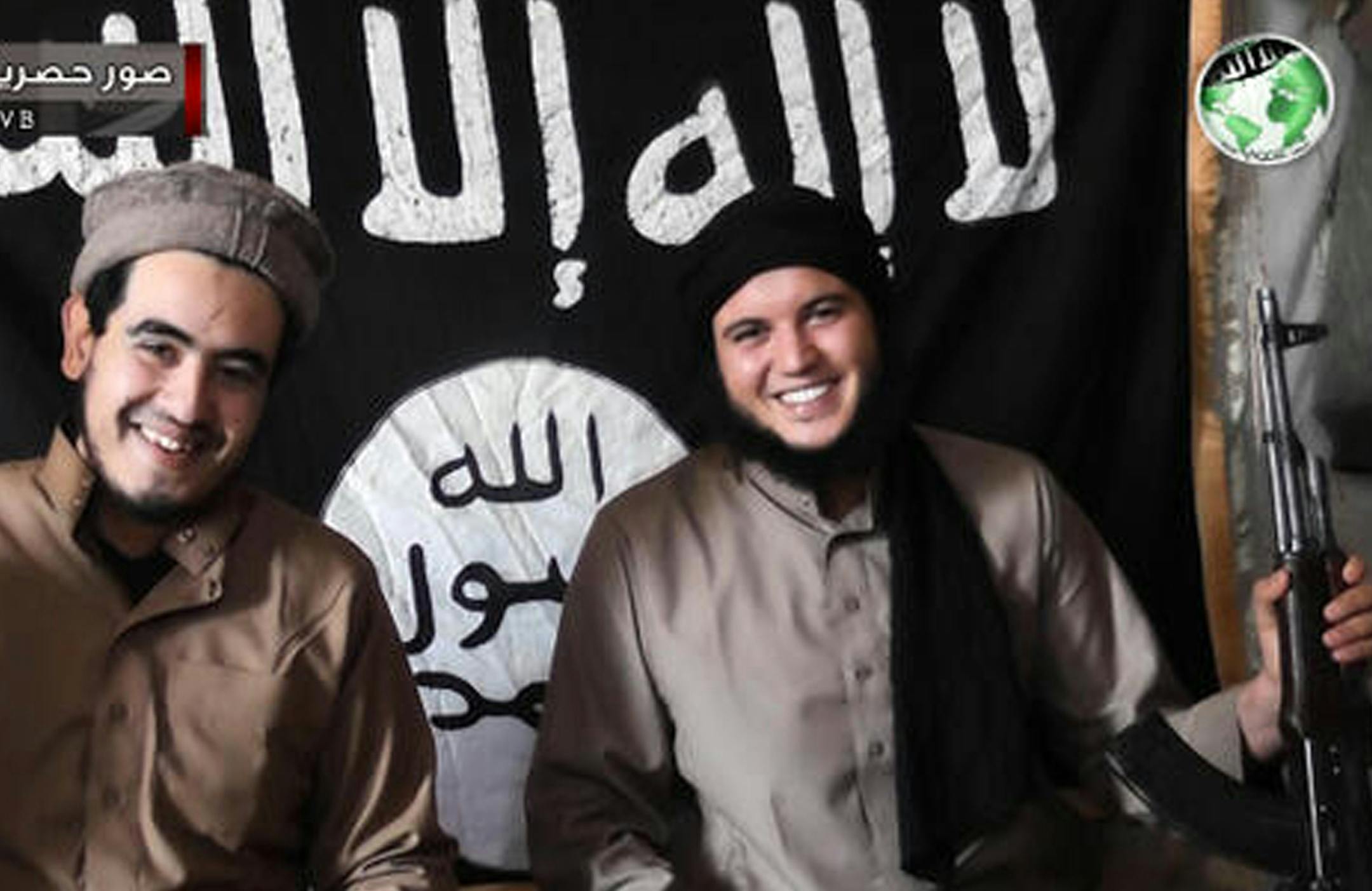 This undated image posted on a militant website purports to show militants in the al-Jazeera region on the Iraqi side of the Syria-Iraq border. Last month, militants inside Iraq killed 48 Syrian government troops who had sought refuge from the war in their country _ an ambush that regional officials now say is evidence of a growing cross-border alliance between two powerful Sunni jihadi groups _ Al-Qaida in Iraq and the Nusra Front in Syria. Two Iraqi intelligence officials said the jihadi group