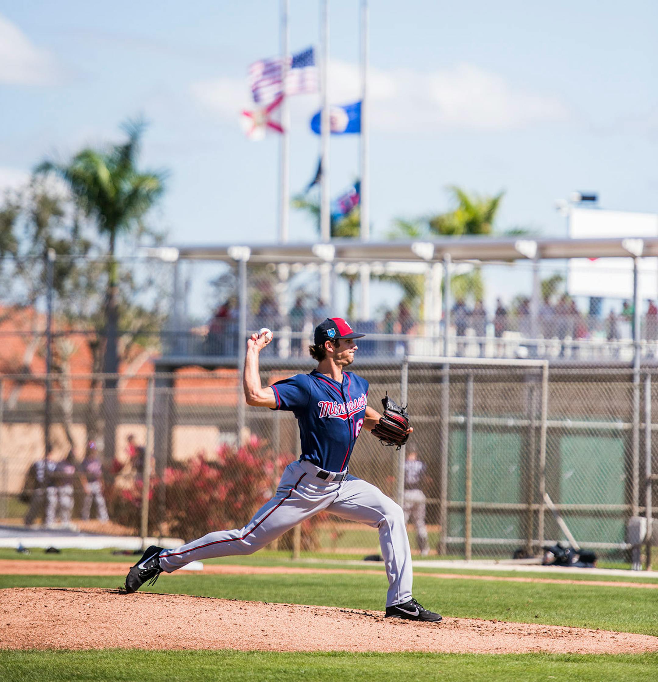 Twins pitcher J.T. Chargois (60) practiced his pitch.