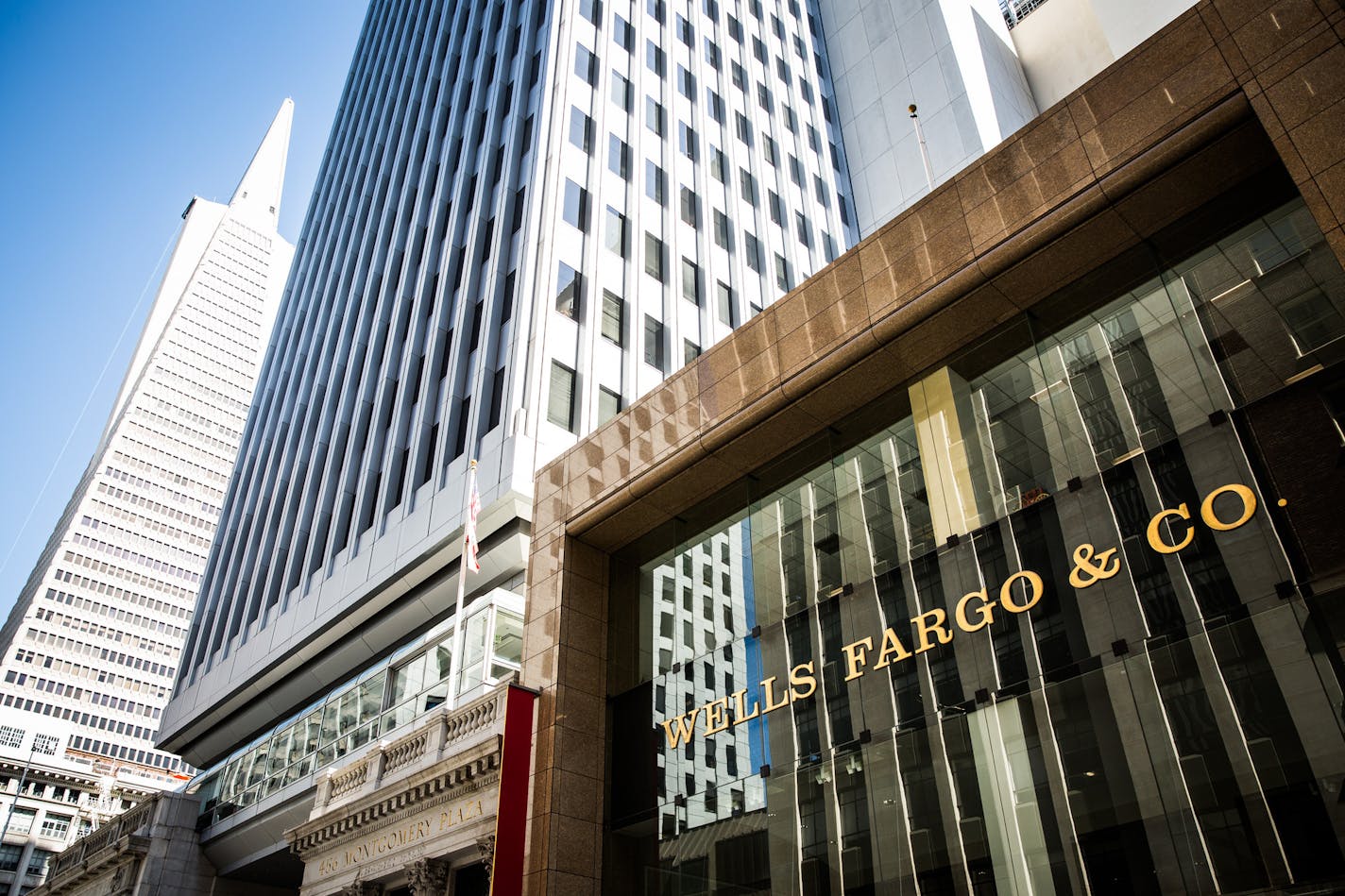 FILE &#xd1; The headquarters of Wells Fargo, in downtown San Francisco, Sept. 16, 2016. The Federal Reserve ordered Wells Fargo to replace four board members and limit its growth until the bank significantly improved its business practices on Feb. 2, 2018, after revelations of dummy accounts and unnecessary insurance sales. (Max Whittaker/The New York Times)