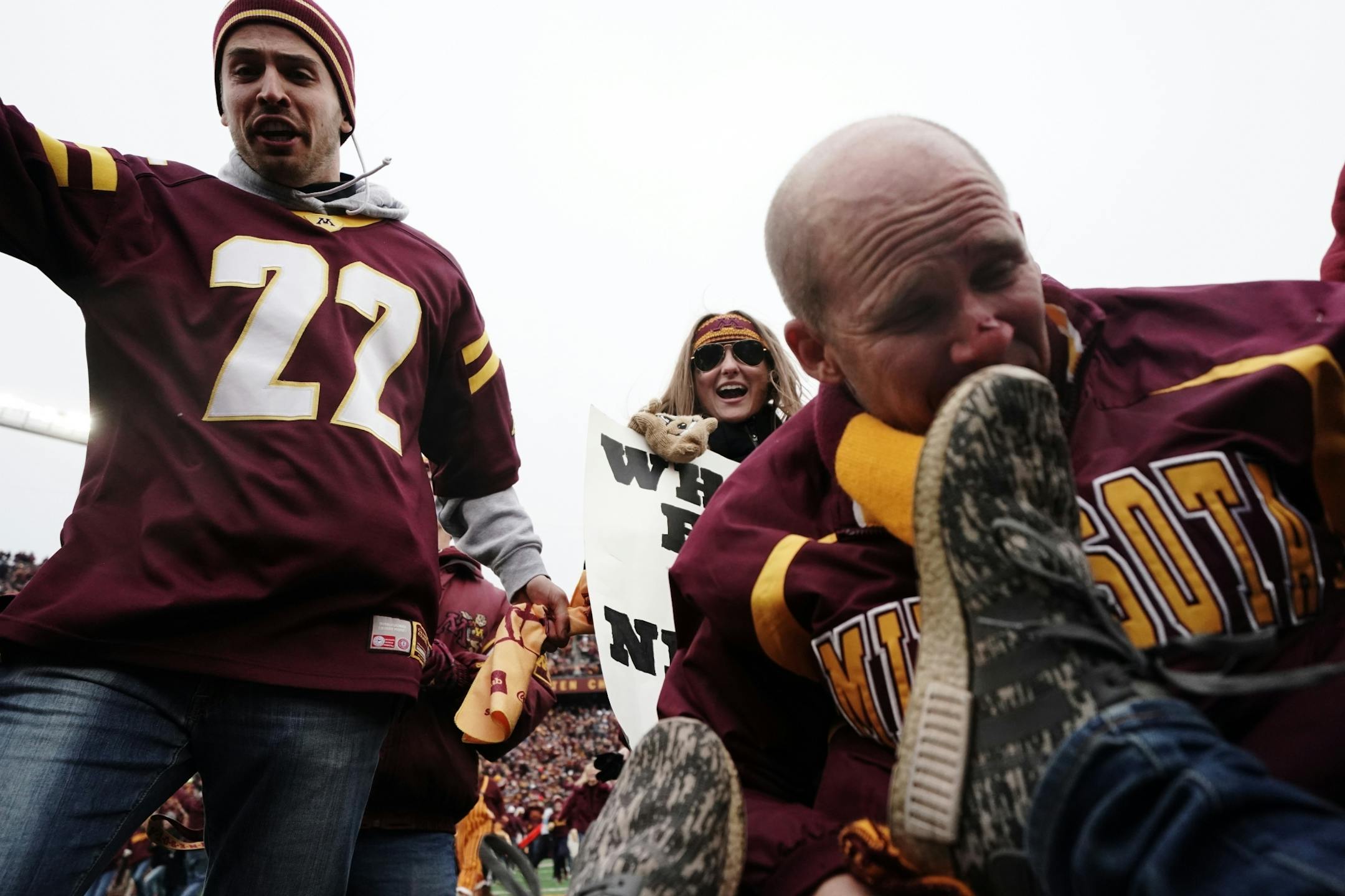 Thousands of Gophers fans stormed the field after Minnesota's 31-26 victory over Penn State.