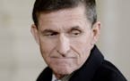 Former national security advisor Michael Flynn attends a press conference with Japanese Prime Minister Shinzo Abe on Friday, Feb. 10, 2017 at the Whit