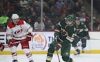 Minnesota Wild left wing Marcus Foligno (17) takes a shot in the first period against the Carolina Hurricanes on Tuesday, March 6, 2018 at Xcel Energy