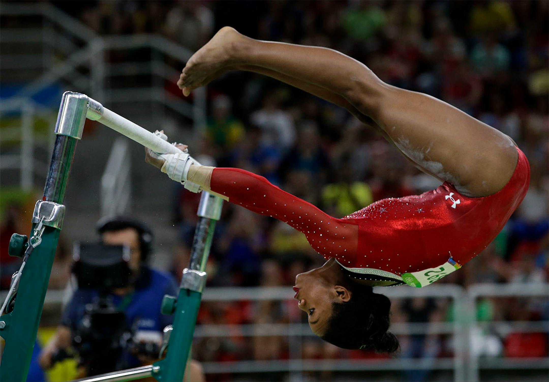 United States' Gabrielle Douglas performs on the uneven bars during the artistic gymnastics women's apparatus final at the 2016 Summer Olympics in Rio de Janeiro, Brazil, Sunday, Aug. 14, 2016.