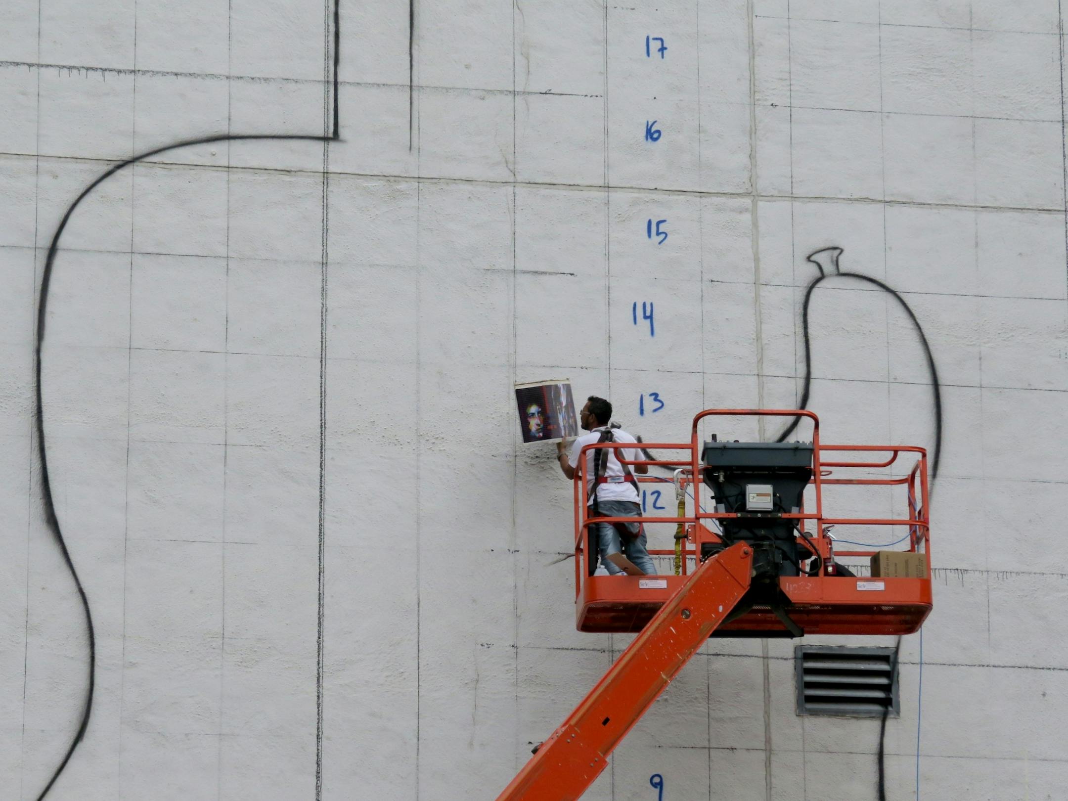 The blank white wall facing the corner of 5th and Hennepin Ave shot Saturday August 29, 2015. The 'canvas' for a mural by Brazillian artist Kobra- with multiple images of Bob Dylan.
