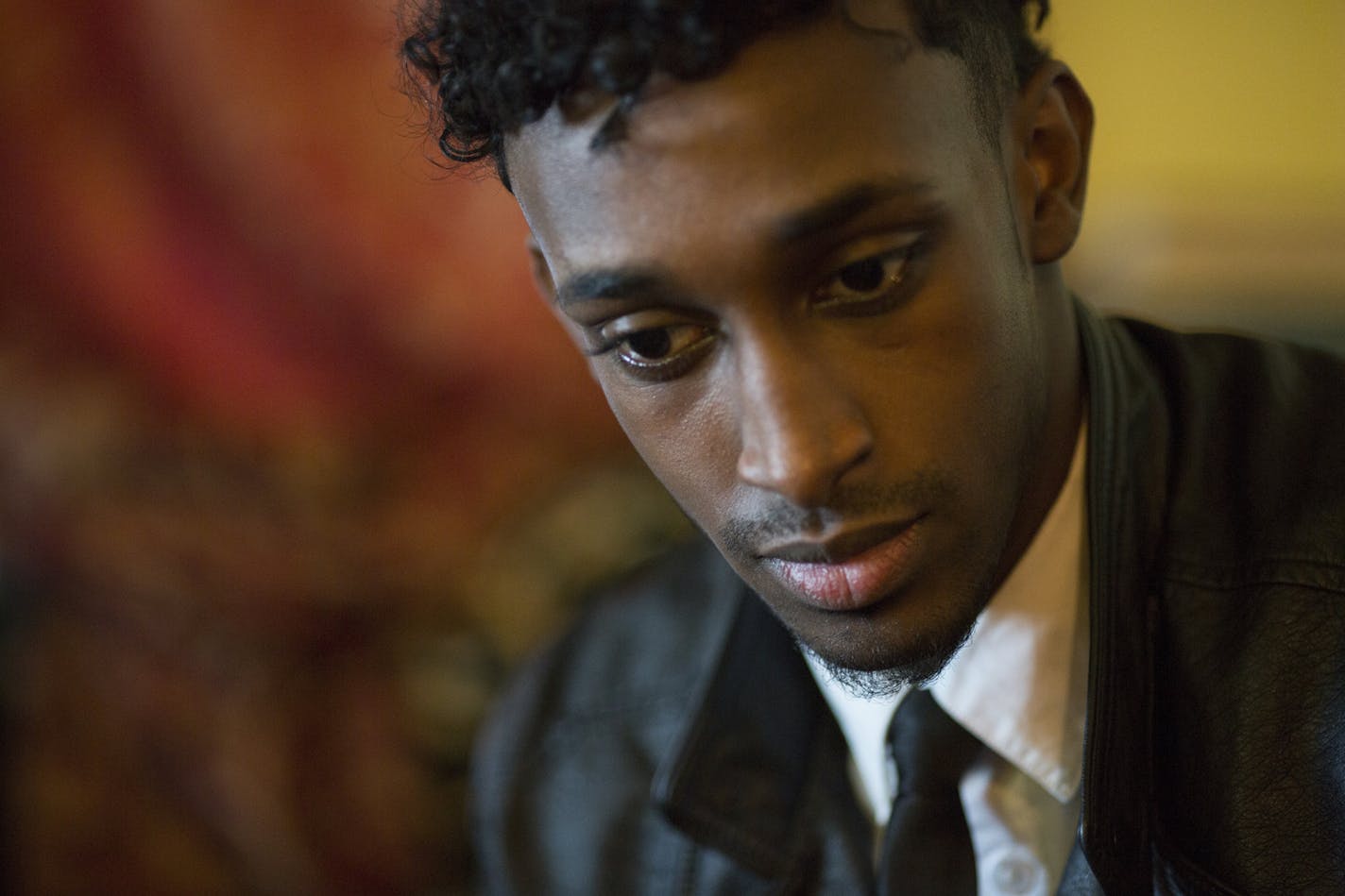 Abdirahman Abdulkadir, 20, an older cousin of Khaalid Abdulkadir, was in deep thought as he spoke about him on Tuesday, March 1, 2016, in Minneapolis, Minn.