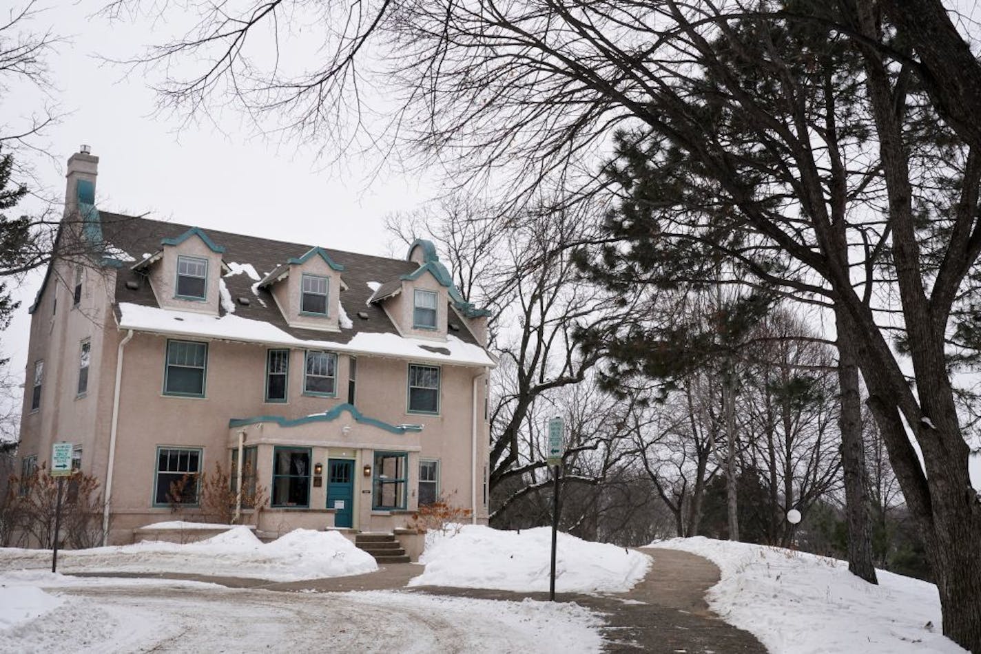 The Theodore Wirth Home and Administrative Building sat among a snowy landscape Thursday at Lyndale Farmstead Park.