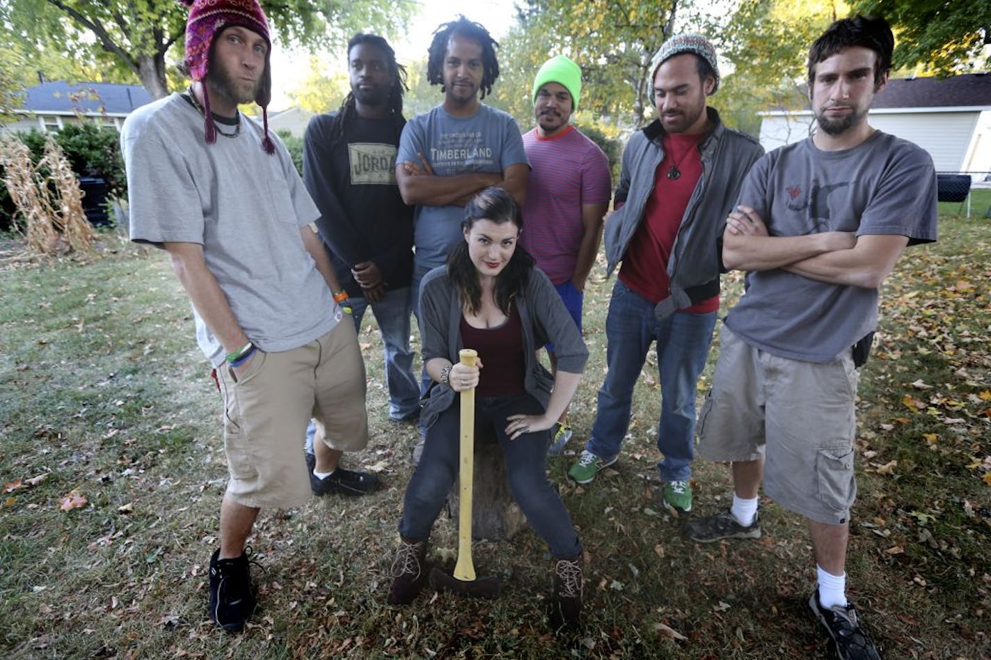 More Than Lights hung out in the back yard of drummer Corey Hess' house in Brooklyn Center. The seven-member band comprises, standing from left: Zach Combs, Harry Philibert, Ruben Rodriguez, Josh Holmgren, Matt Unga, Hess and (seated) Natalie Fine.