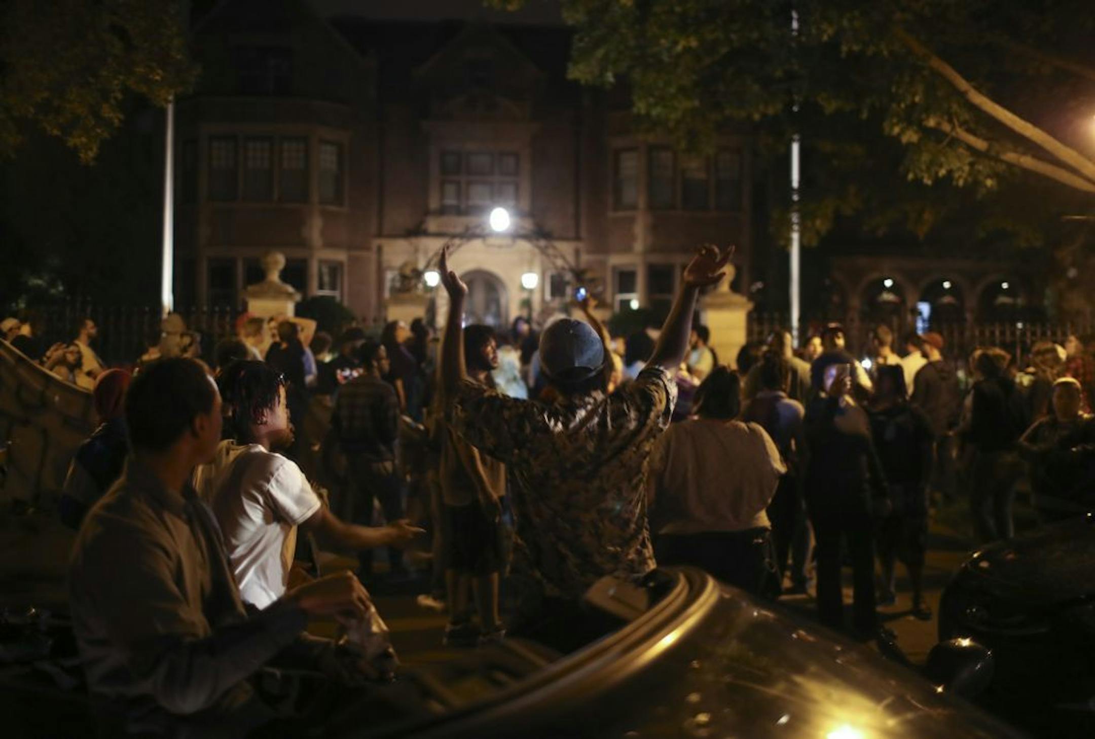 Demonstrators angry after the fatal shooting of Philando Castile by police chanted and honked horns early Thursday, July 7, 2016 as they blocked Summit Avenue in front of the governor's residence in St. Paul.