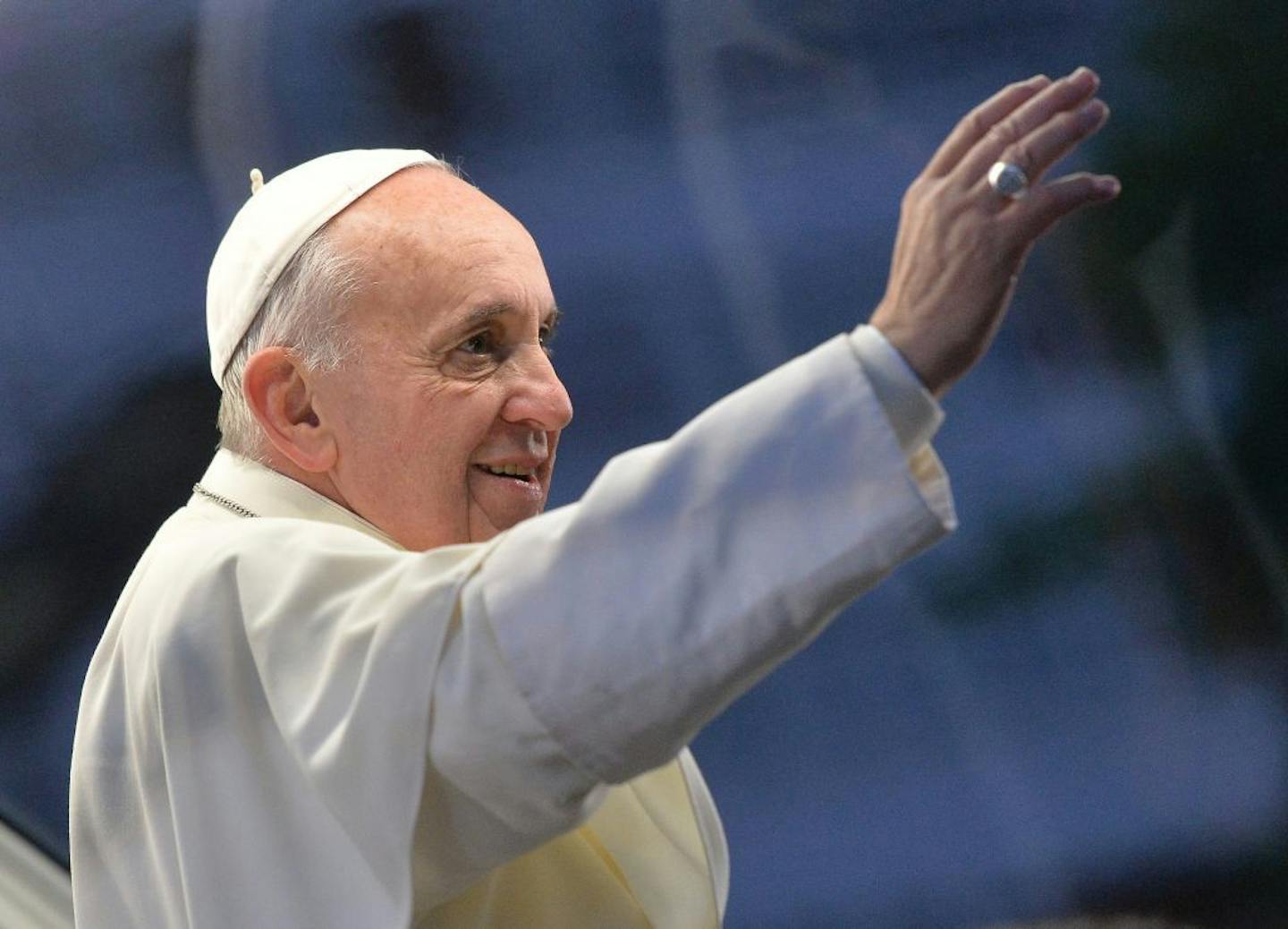 Pope Francis waves to pilgrims in Rio de Janeiro, Brazil.