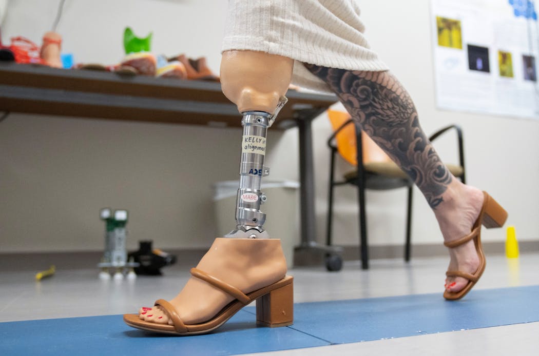 Kelly Yun, a prosthetic technician and designer, demonstrated the Modular Prosthetic Ankle Feet System Thursday at Minneapolis VA Health Care System in Minneapolis. Yun lost her leg in a motorcycle accident five years ago and immediately went to school to learn about the world of prosthetics.